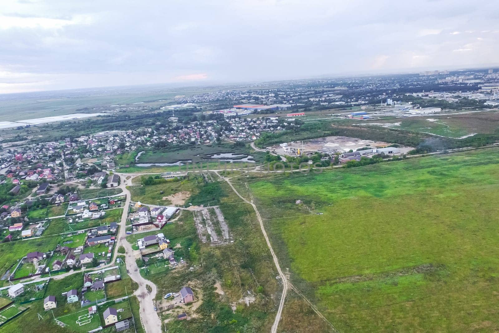 Top view of the village, fields and forests near the village