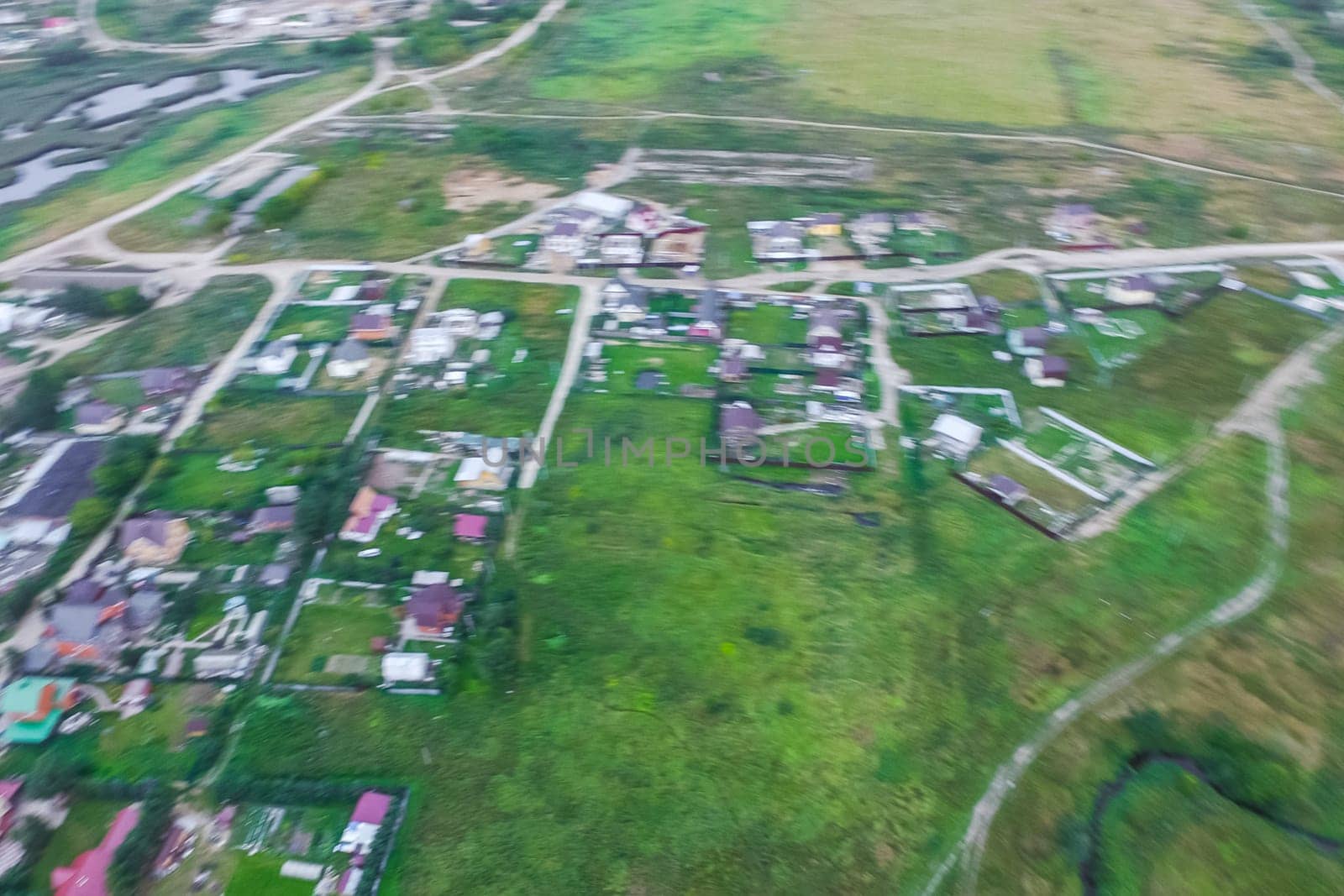 Top view of the village, fields and forests near the village