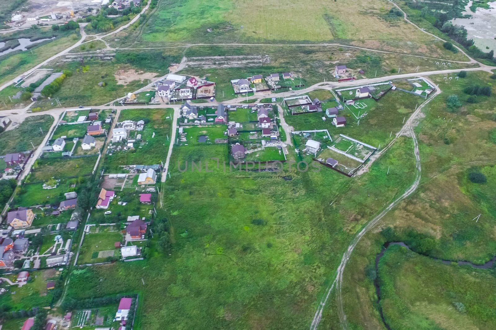 Top view of the village, fields and forests near the village