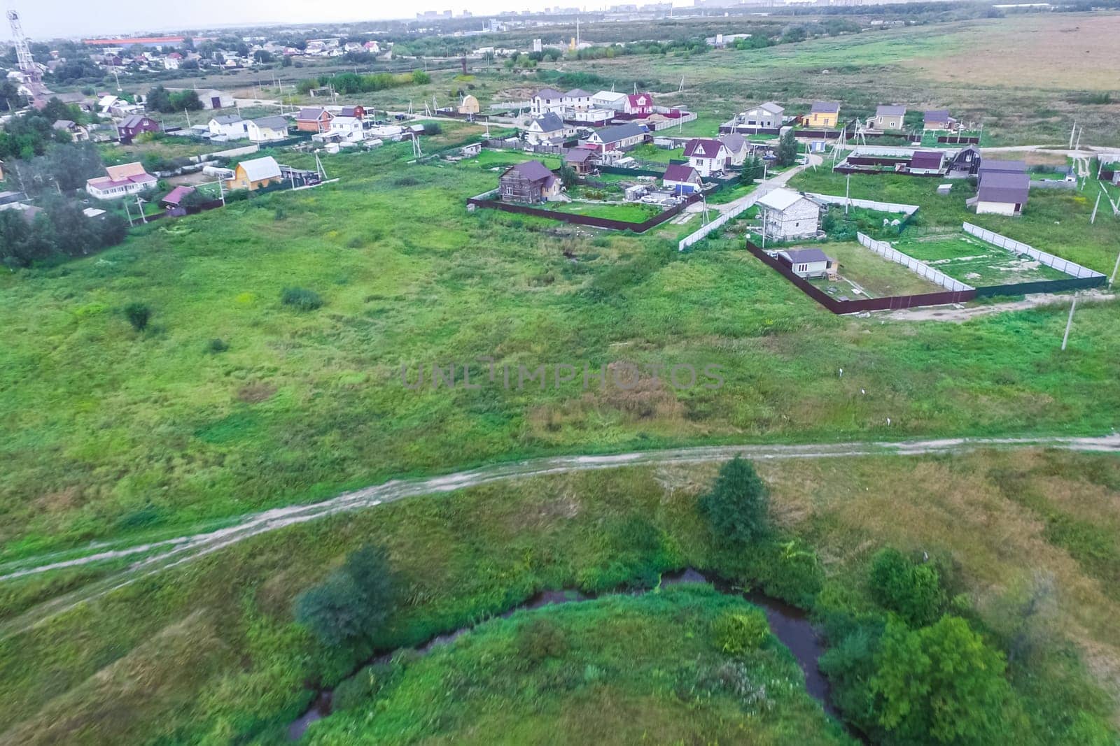 Top view of the village, fields and forests near the village