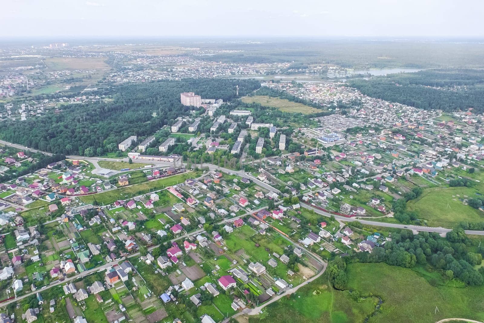 Top view of the village, fields and forests near the village