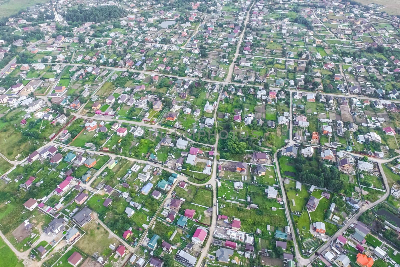Top view of the village, fields and forests near the village