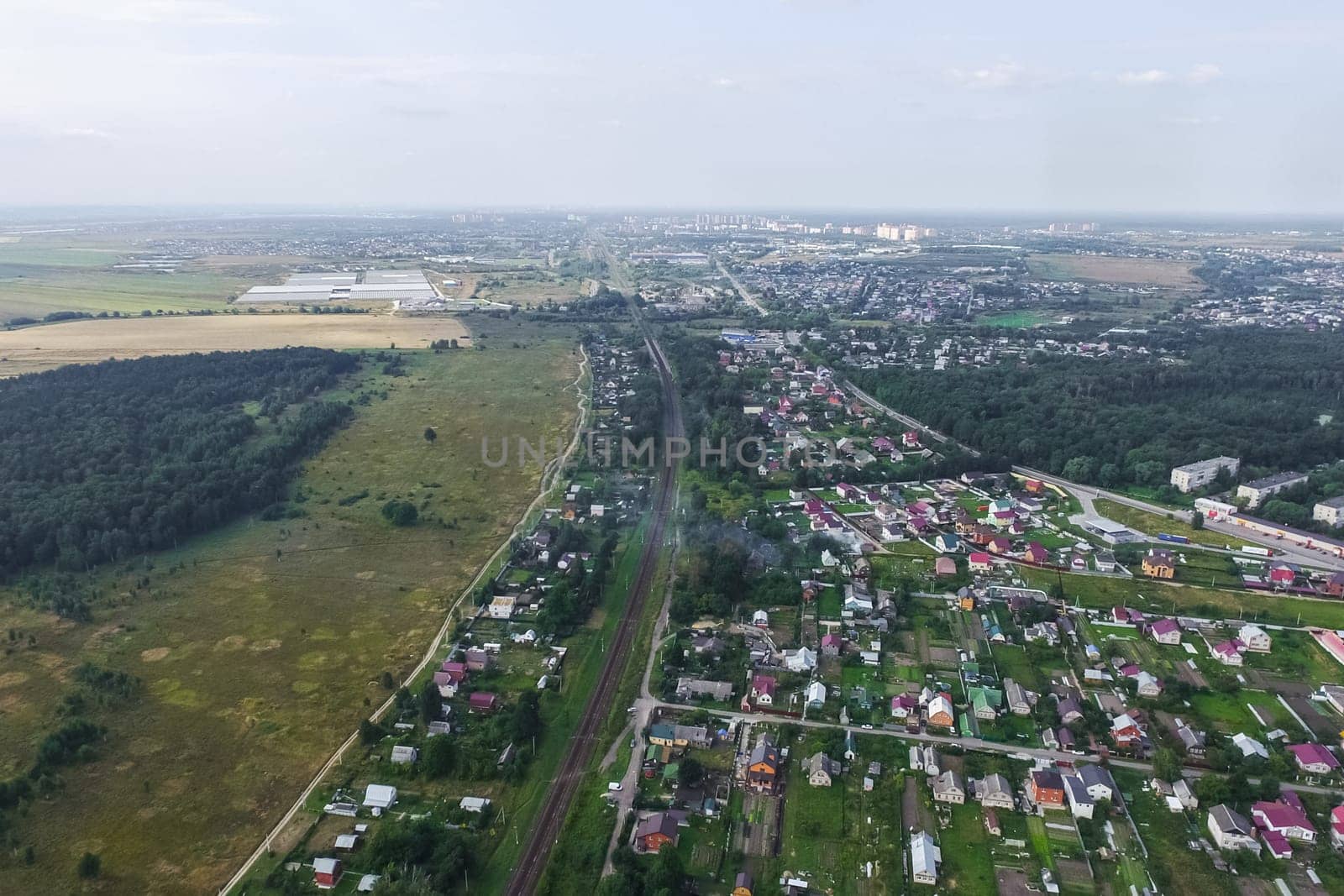 Top view of the village, fields and forests near the village
