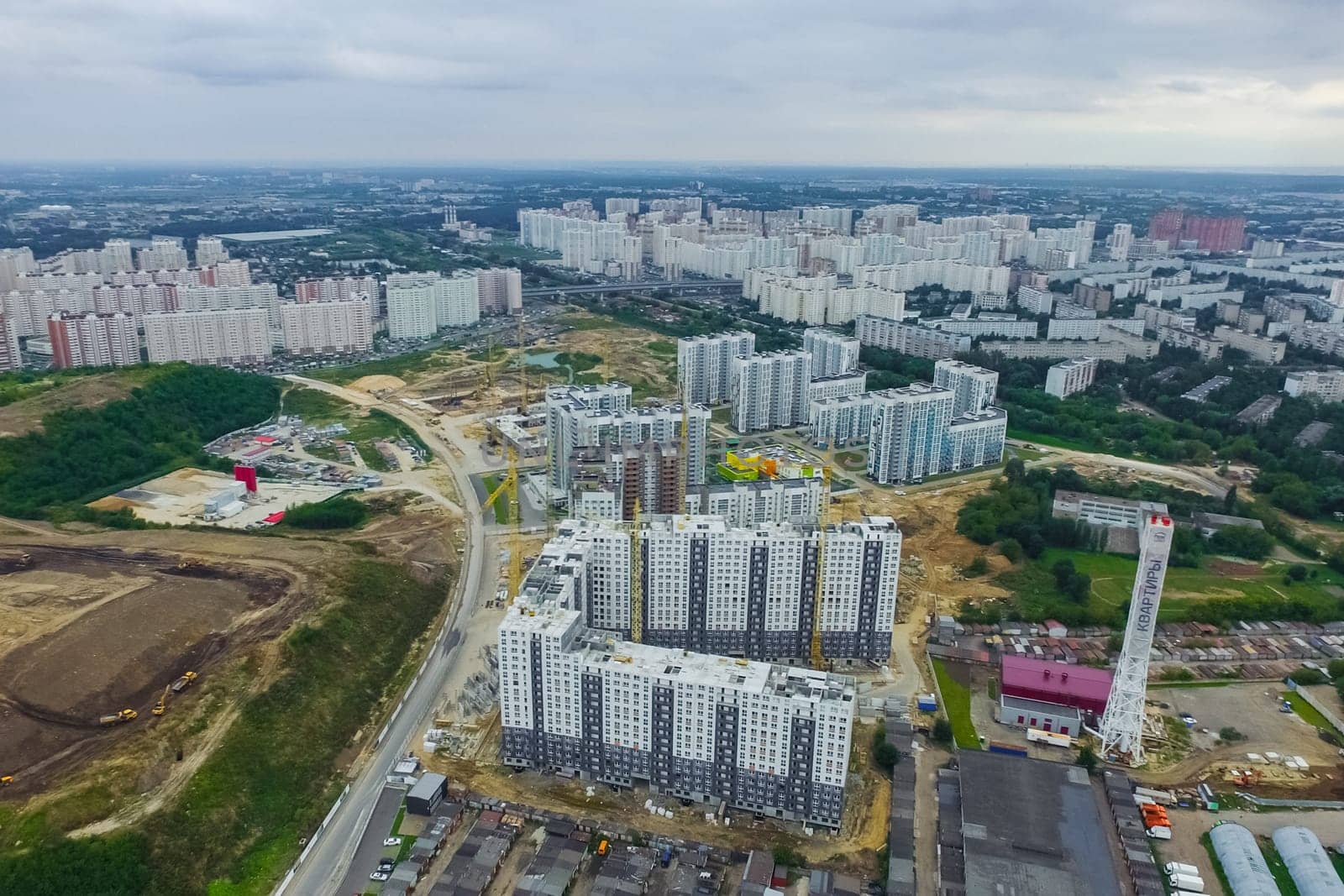 Top view of the city of Moscow, buildings and roads and other infrastructure of the city. Cityscape view from above.