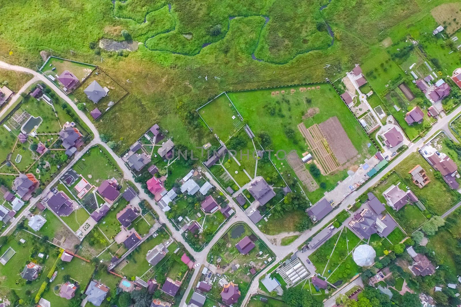 Top view of the village, fields and forests near the village
