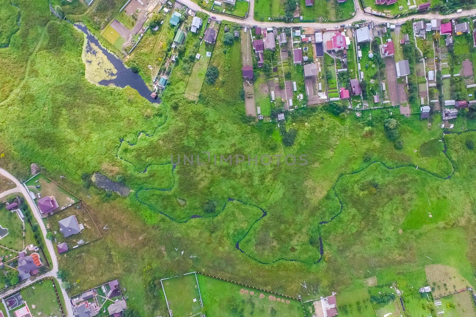 Top view of the village, fields and forests near the village