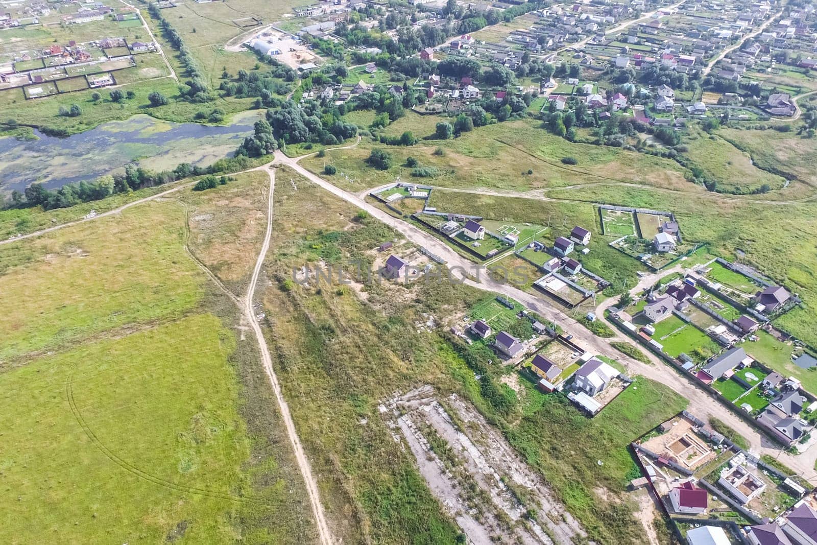 Top view of the village, fields and forests near the village