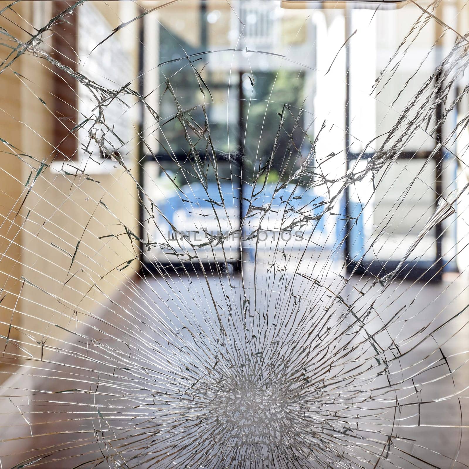 Shattered glass. Concept security theft damage vandalism in an apartment building.