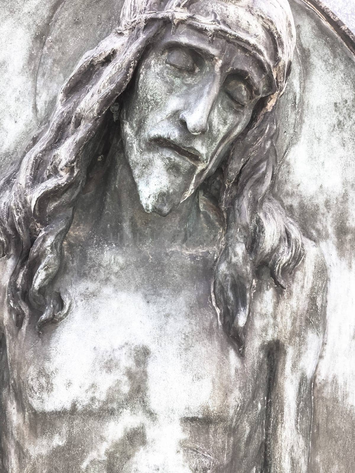 Jesus Christ. An ancient statue. Religion, faith, death, suffering, immortality, God concept.