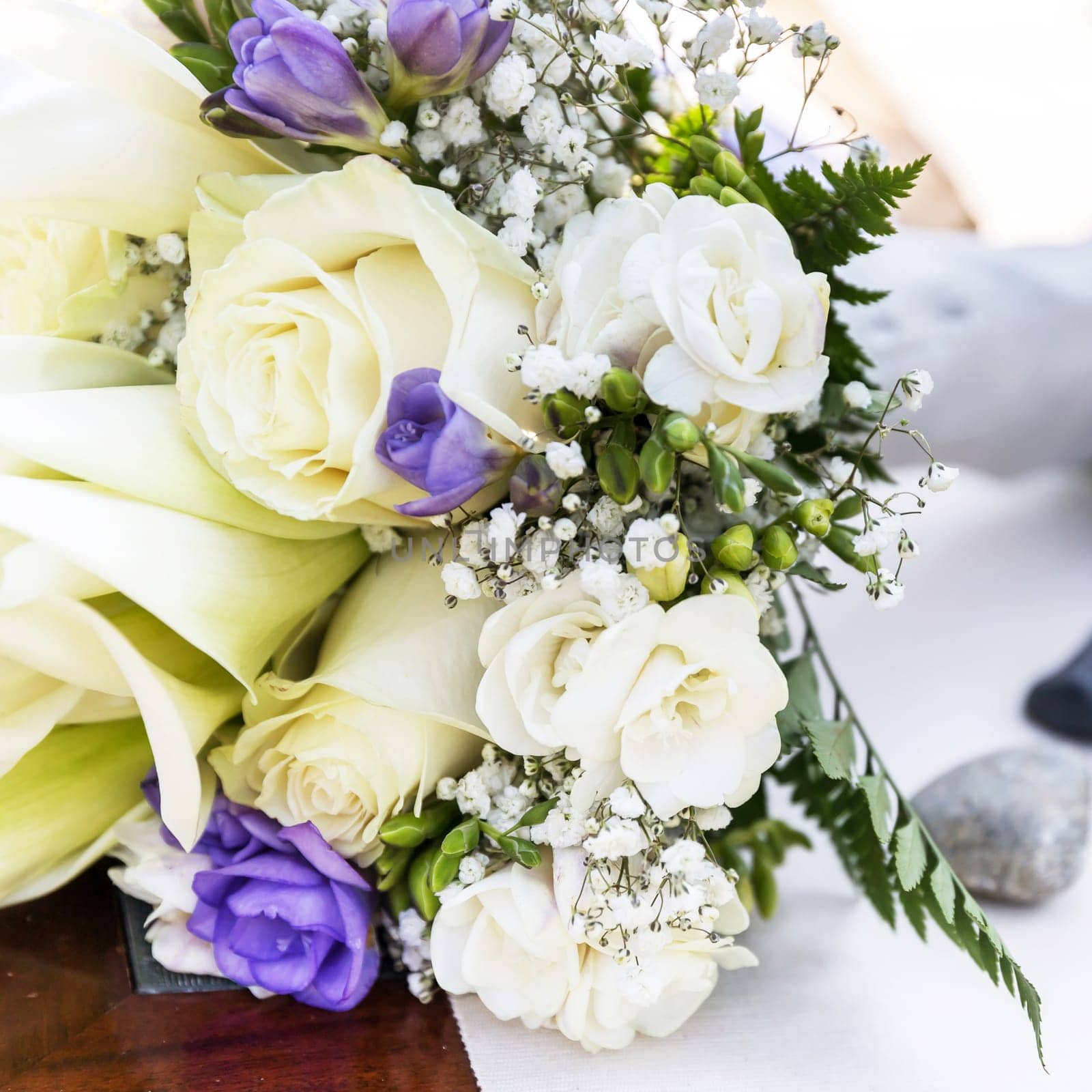Bridal bouquet. Flower bouquet of marriage, on blurred background. Party, event.