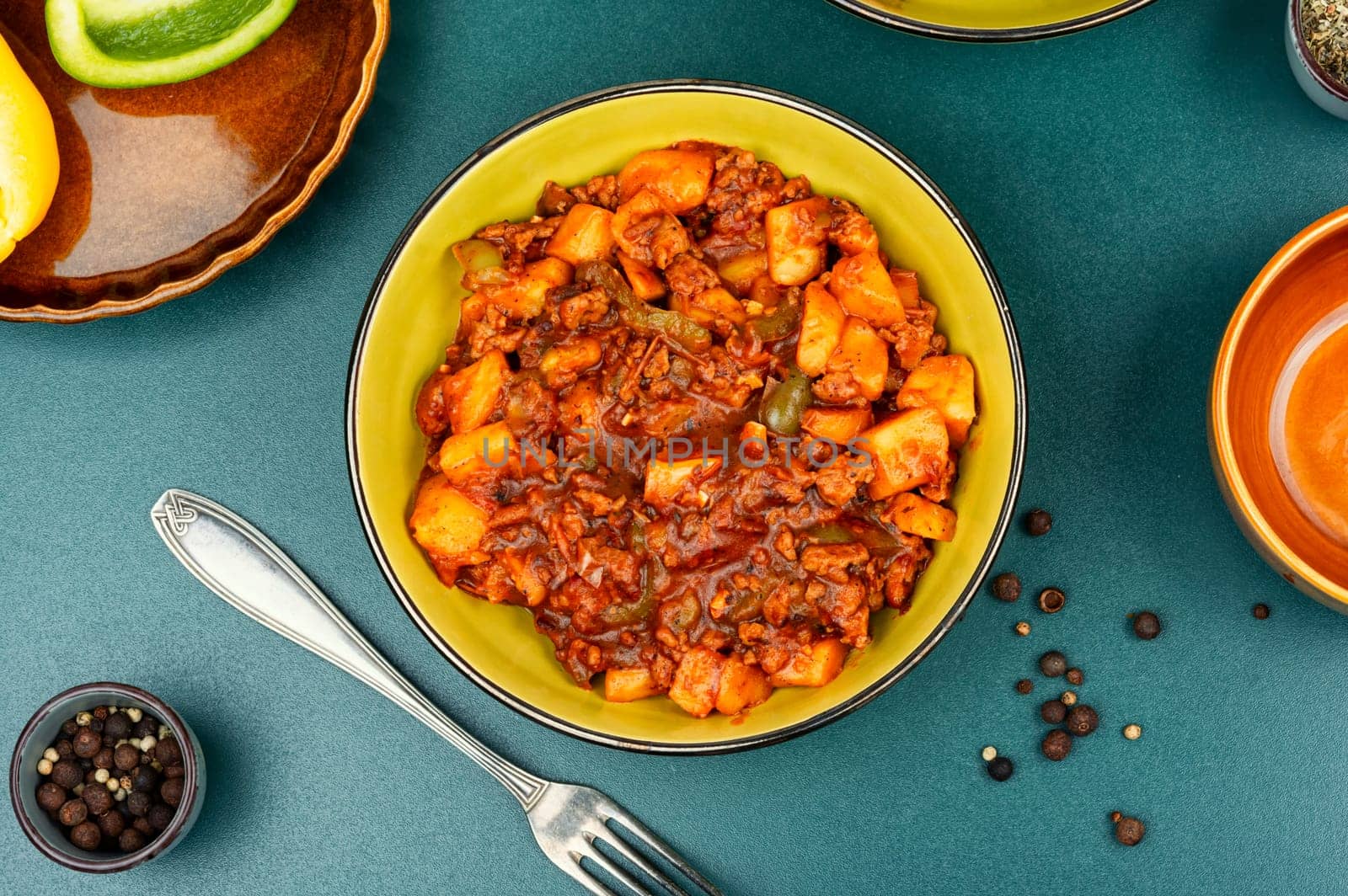 Stewed potatoes with minced turkey. German cuisine. Copy space.