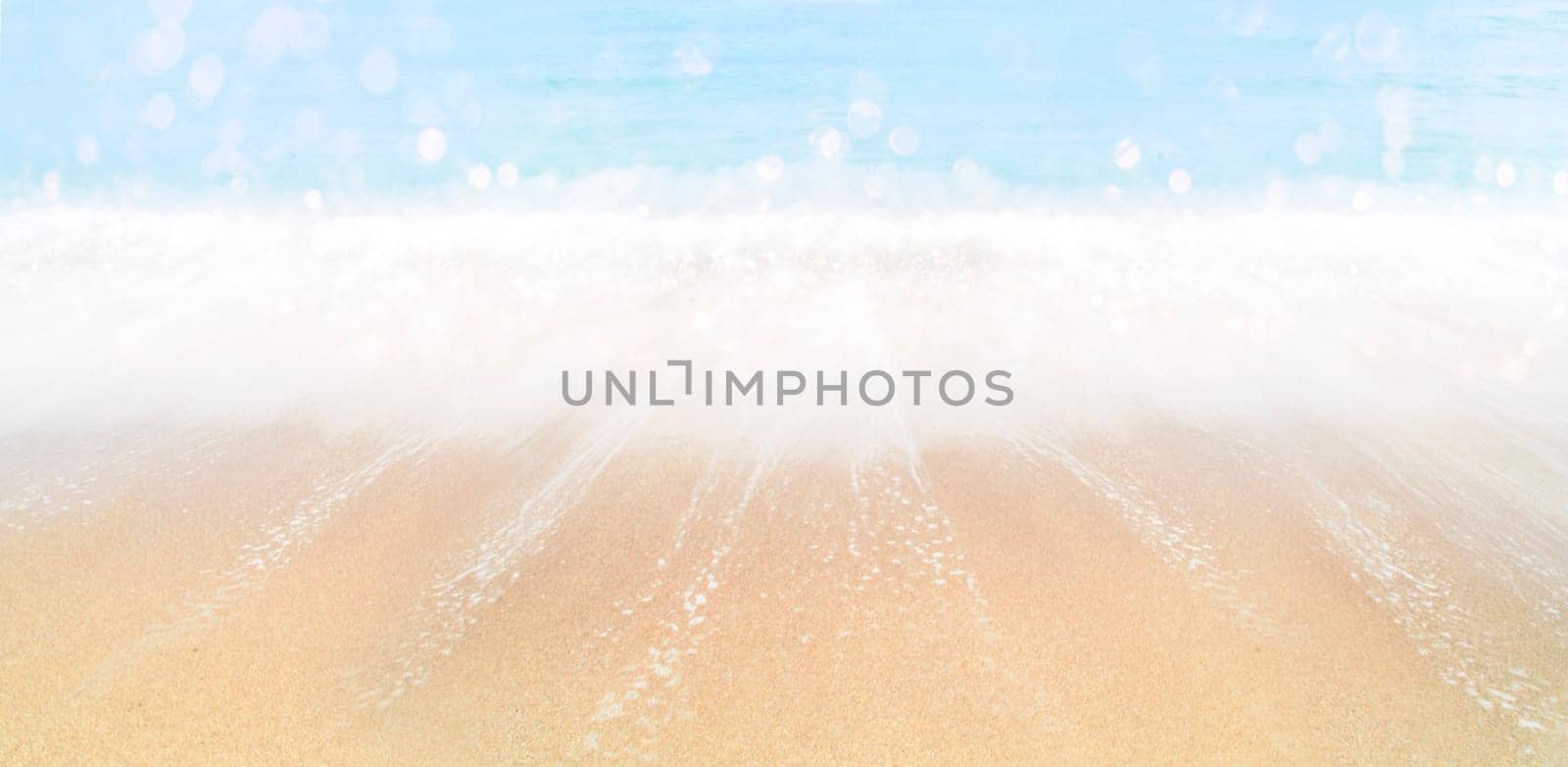 Summer holiday travel background design. Blurred sand and sea landscape banner. Tropical sandy beach with sea waves bokeh.