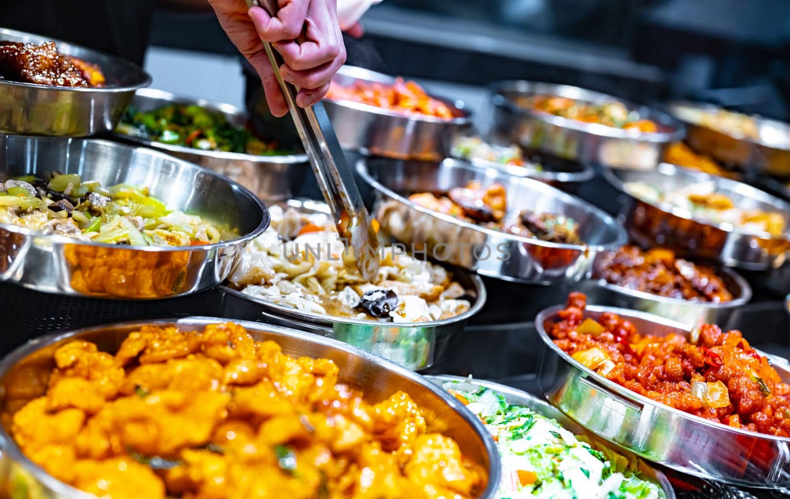 Traditional Asian dishes sold in a shopping mall food court in Singapore.