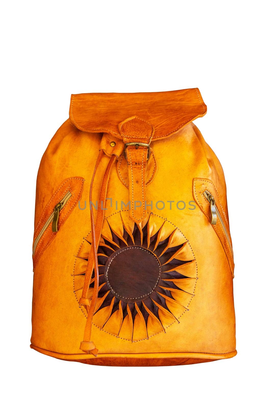 Leather canvas backpack. Closeup of a brown handmade vintage leather backpack isolated on a white background. Brown leather bag for travelers. Clipping path.