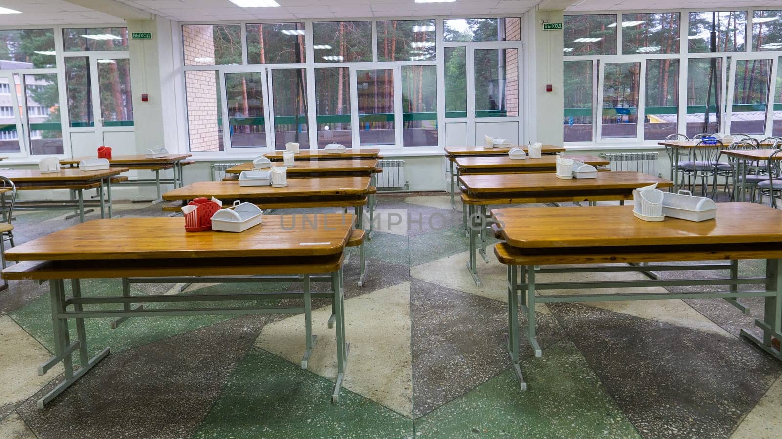 Chairs and tables. The dining hall is quarantined.