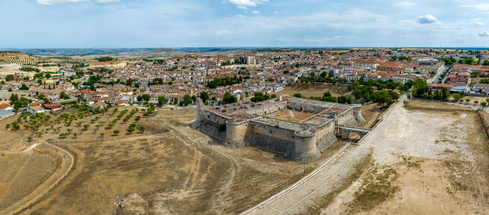 Panoramic aerial view of the Medieval Castle of Chinchon, province of Madrid. cataloged as beautiful towns of Spain