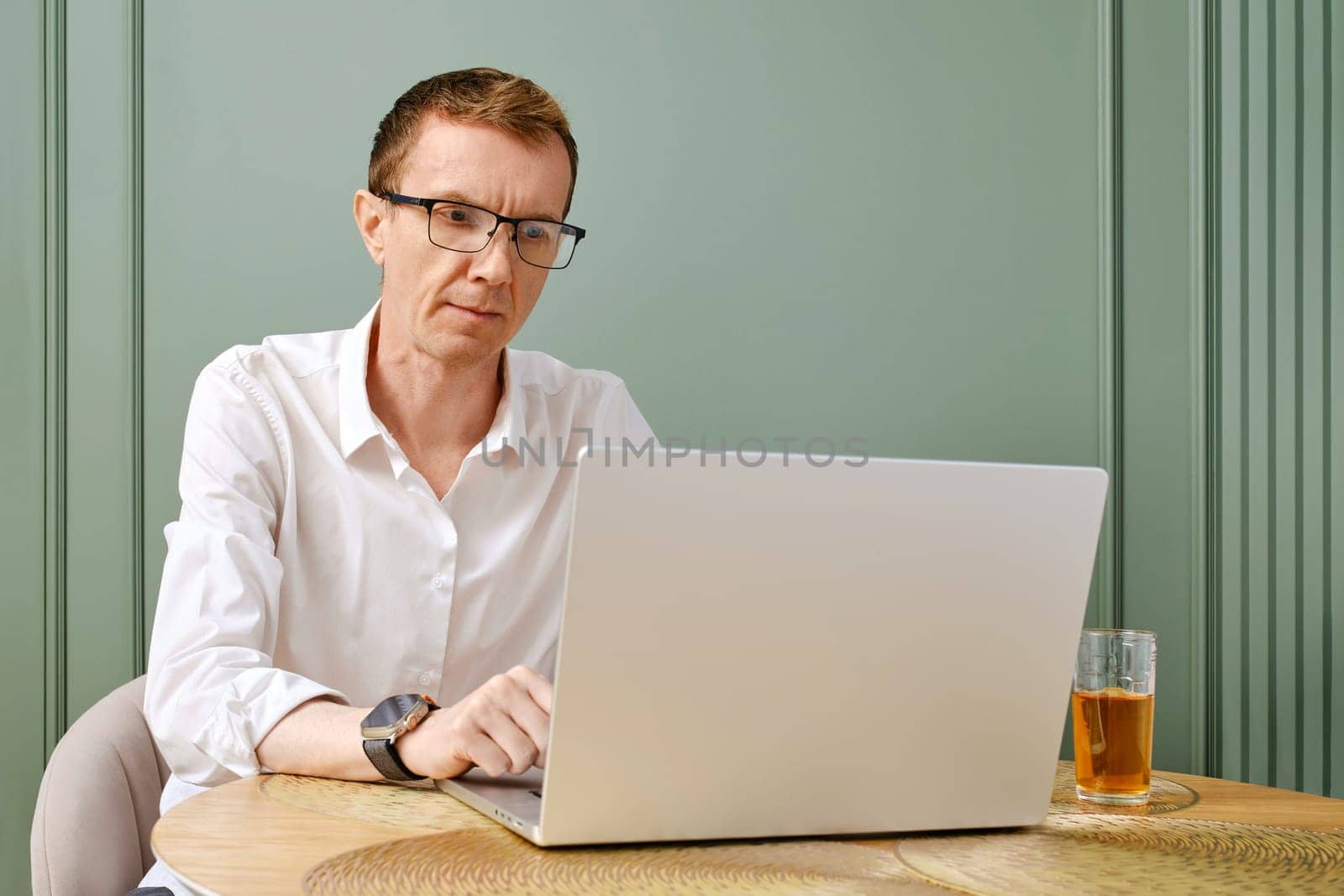 Middle aged entrepreneur owner of small business working online from home