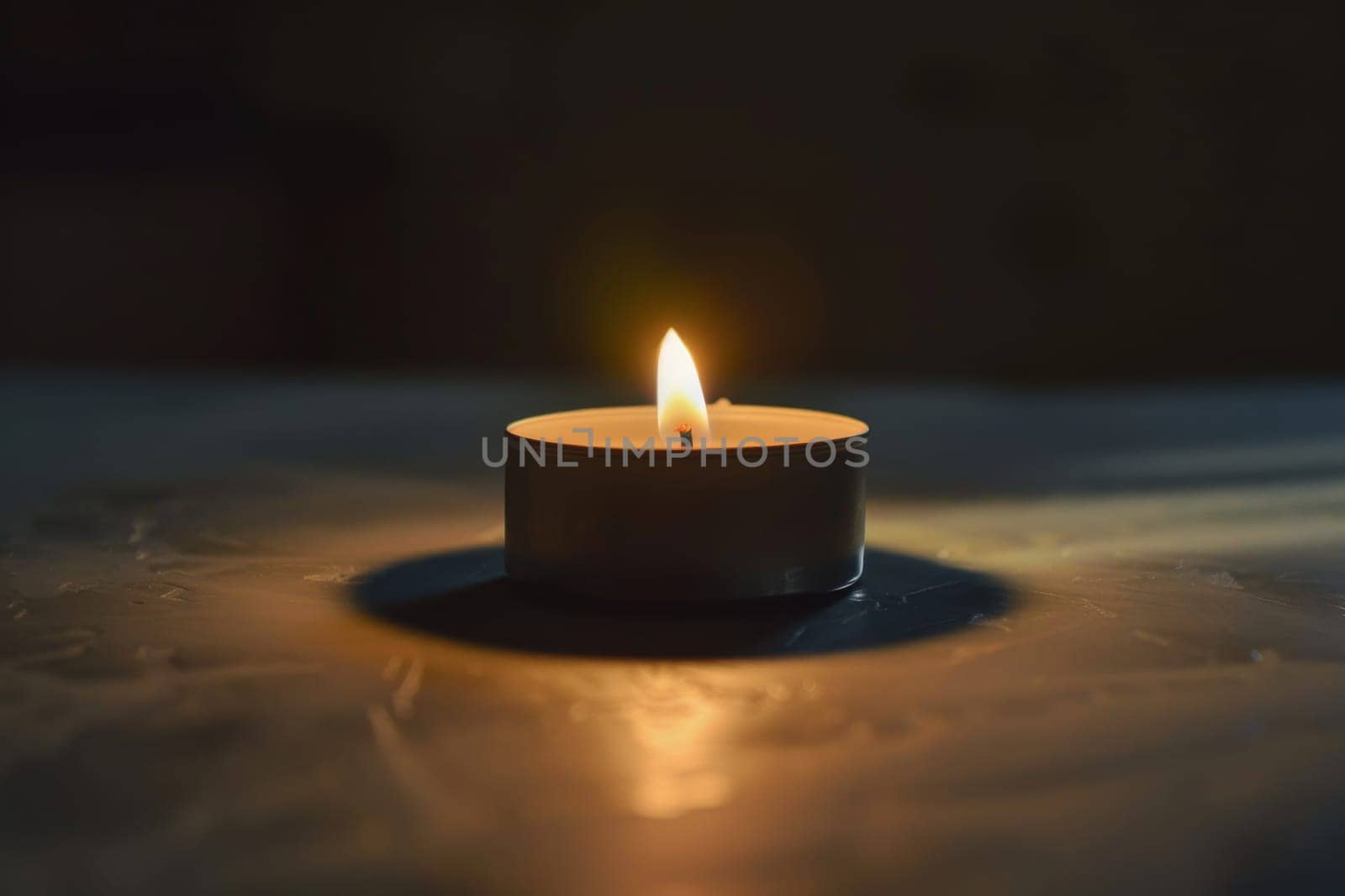 Flickering candle flame illuminating the darkness against a transparent white surface, perfect for meditation and relaxation