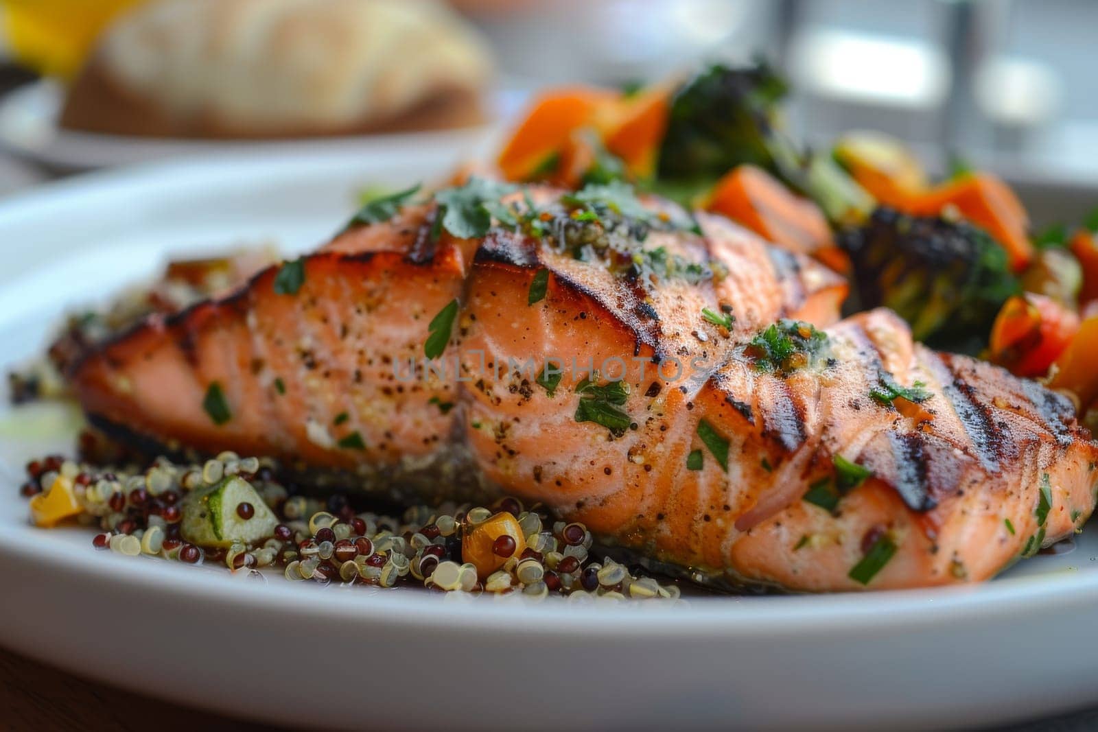 Plate of grilled salmon with quinoa and roasted vegetables, a nutritious dinner choice