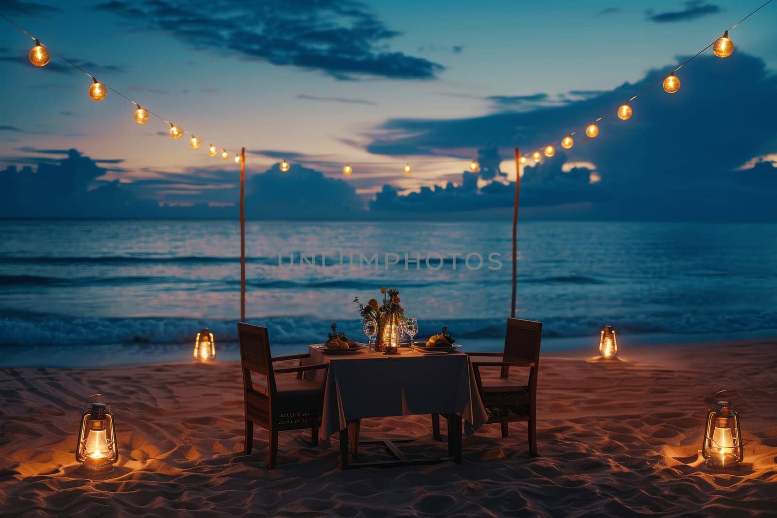 Romantic dinner setup on a beach at twilight
