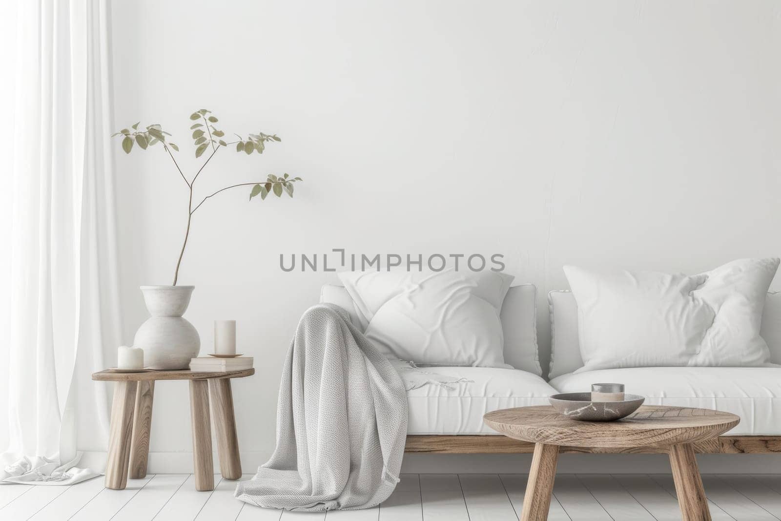 A white living room with a couch, coffee table, and a vase with a plant. The room has a clean and minimalist look, with a focus on the white color scheme