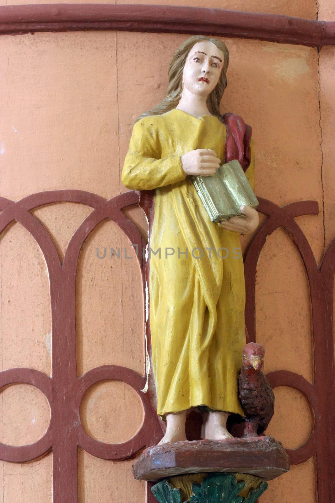 Saint John the Evangelist, statue on Pulpit in the parish church of Saint Emeric in Kostel, Croatia