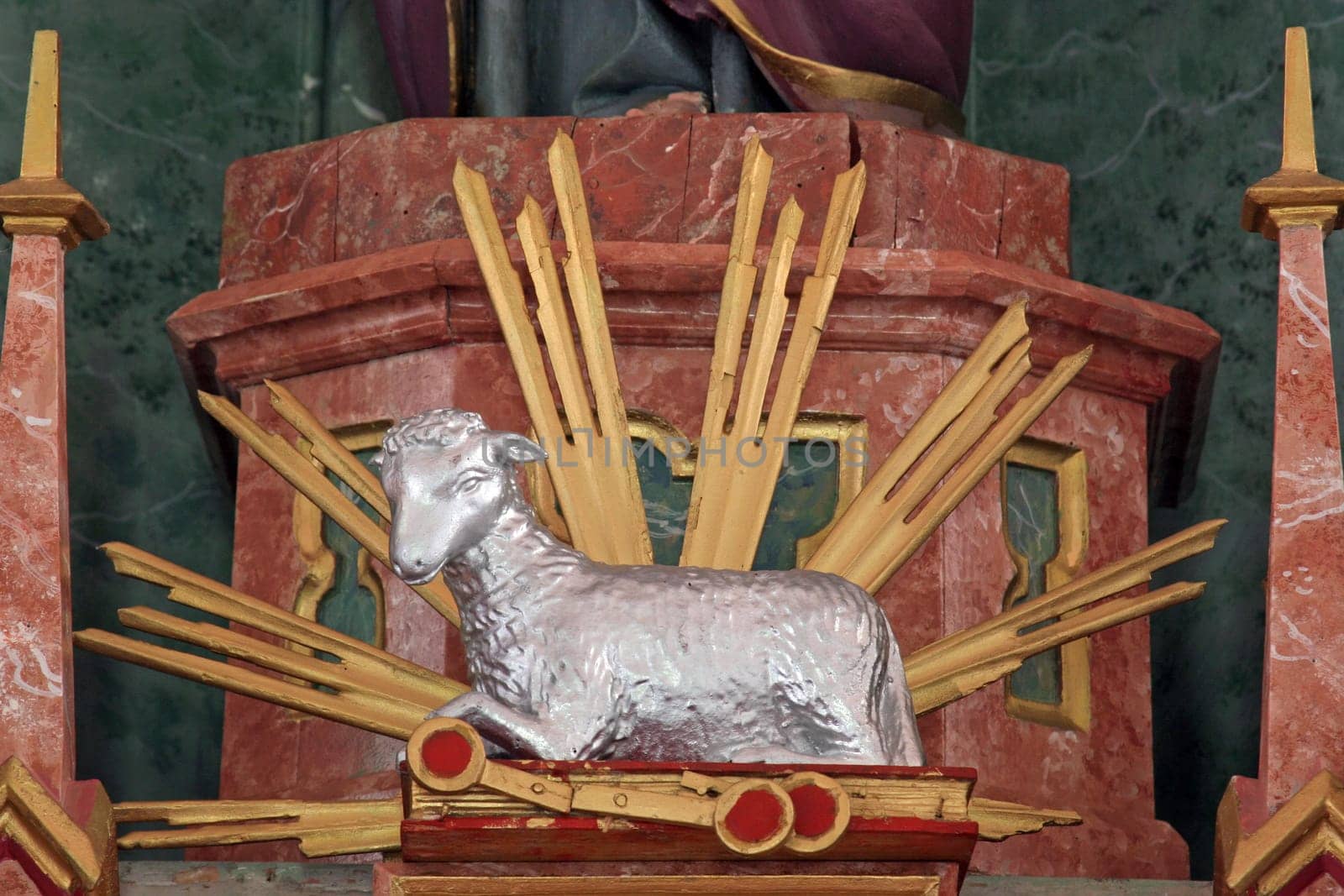 Agnus Dei, Lamb of God, statue on the High altar in the parish church of Saint Luke in Lukac, Croatia