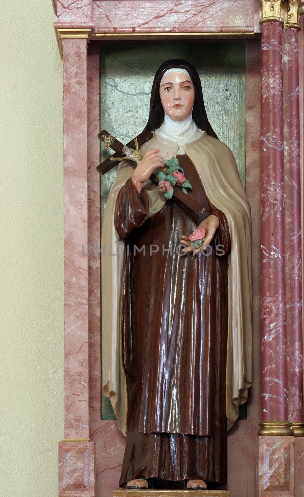 Saint Teresa, statue on the altar of Sacred Heart of Jesus in the parish church of Saint Luke in Lukac, Croatia