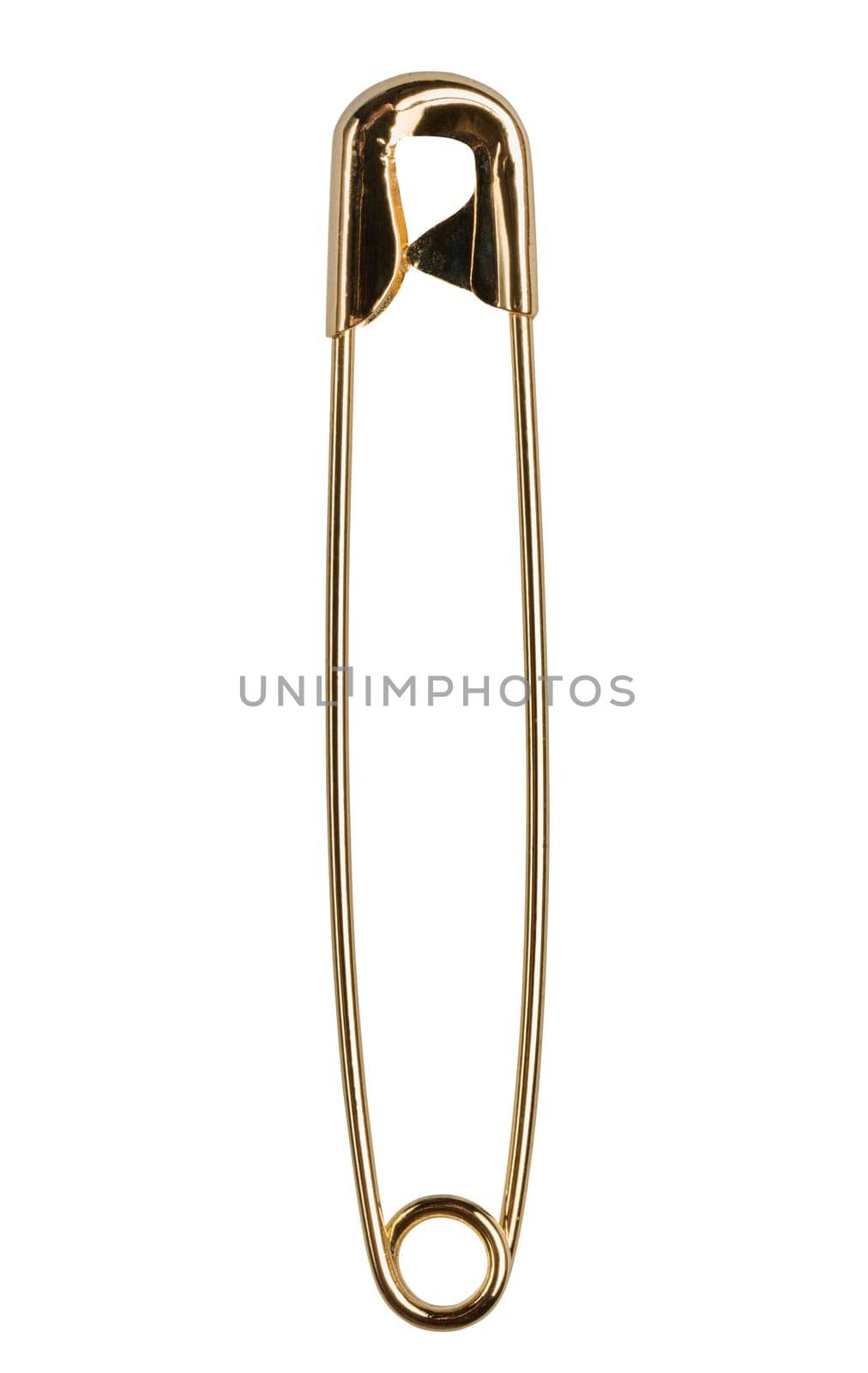 Golden metal safety pin on isolated background, close up
