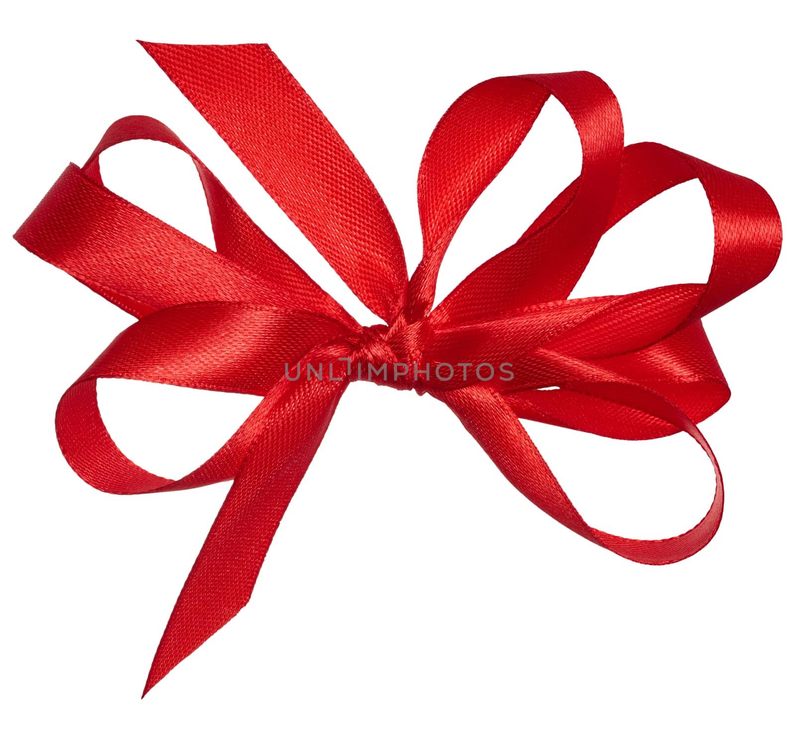 Knotted yellow silk ribbon in a bow on an isolated background, top view