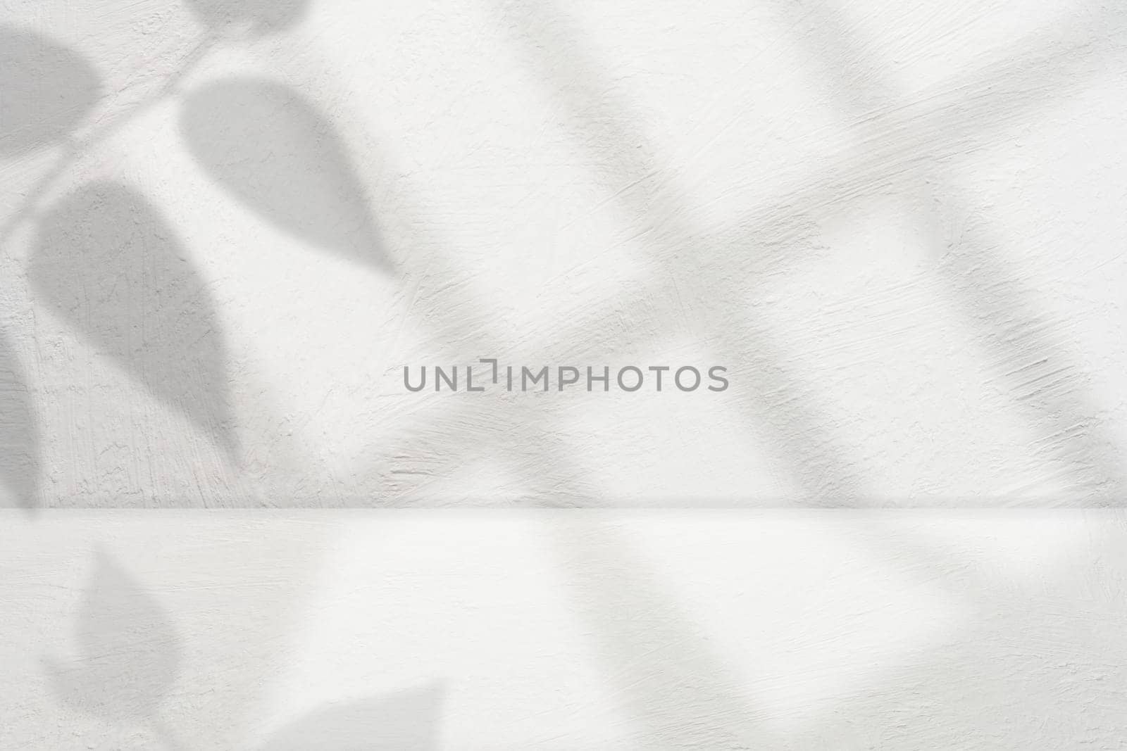 White cement stage with shadow for advertising and product display. Copy space