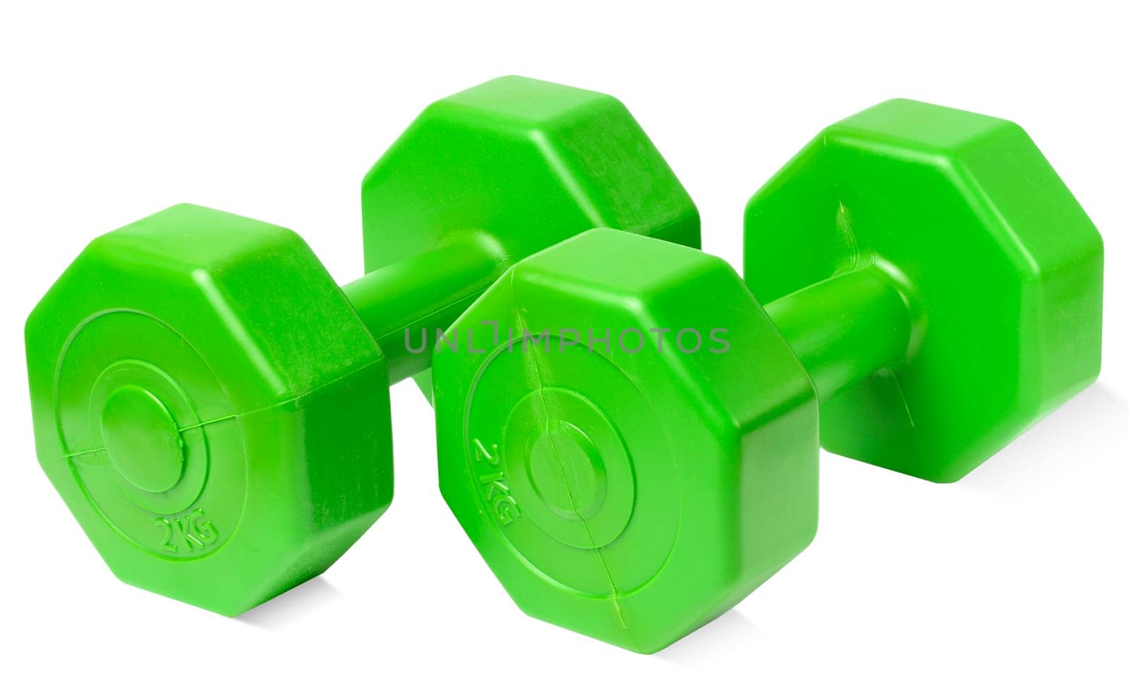 Green plastic dumbbell on a white isolated background, sports equipment. set