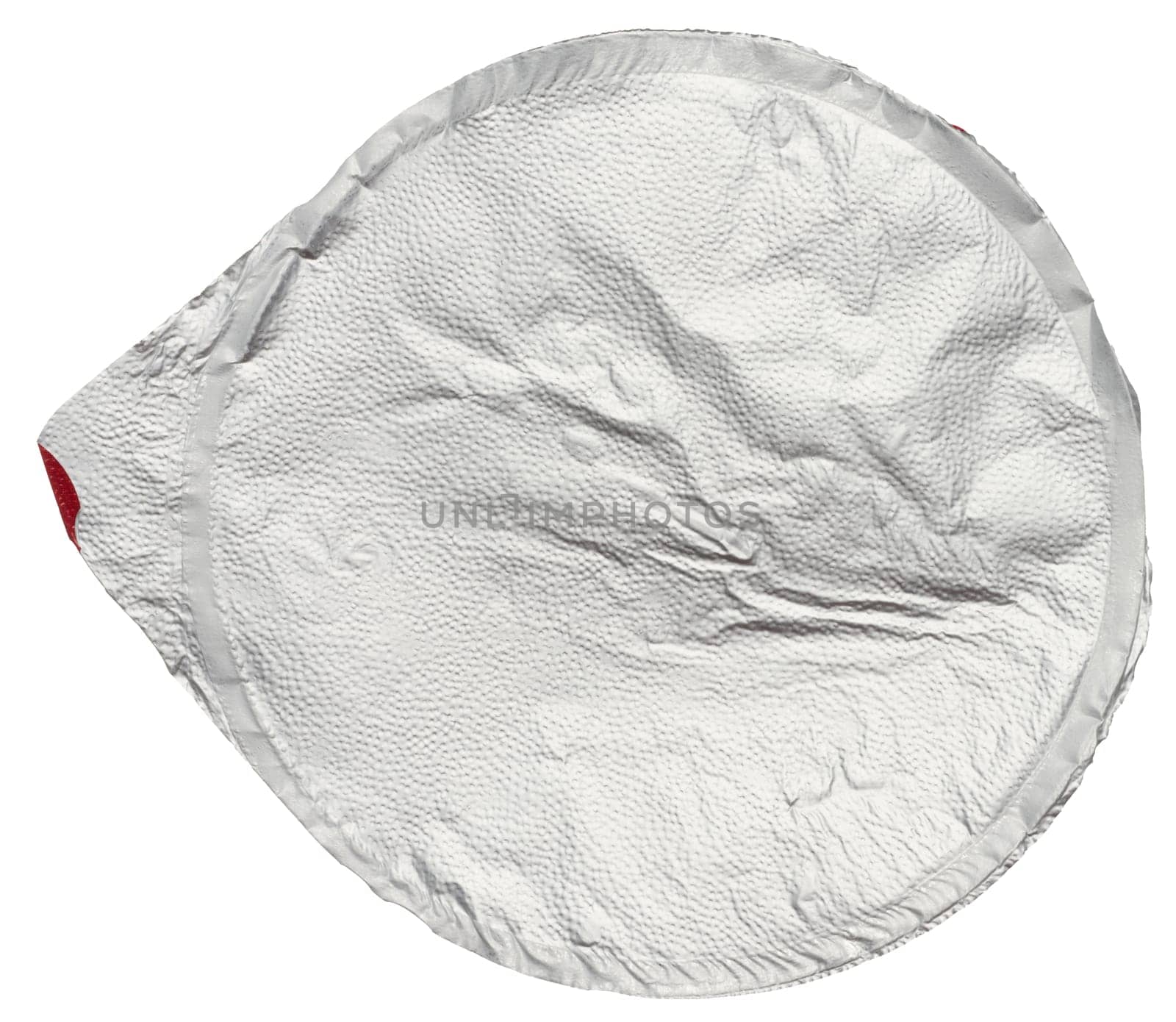 Round aluminum thin lid for plastic yogurt jars, sour cream on a white background, top view