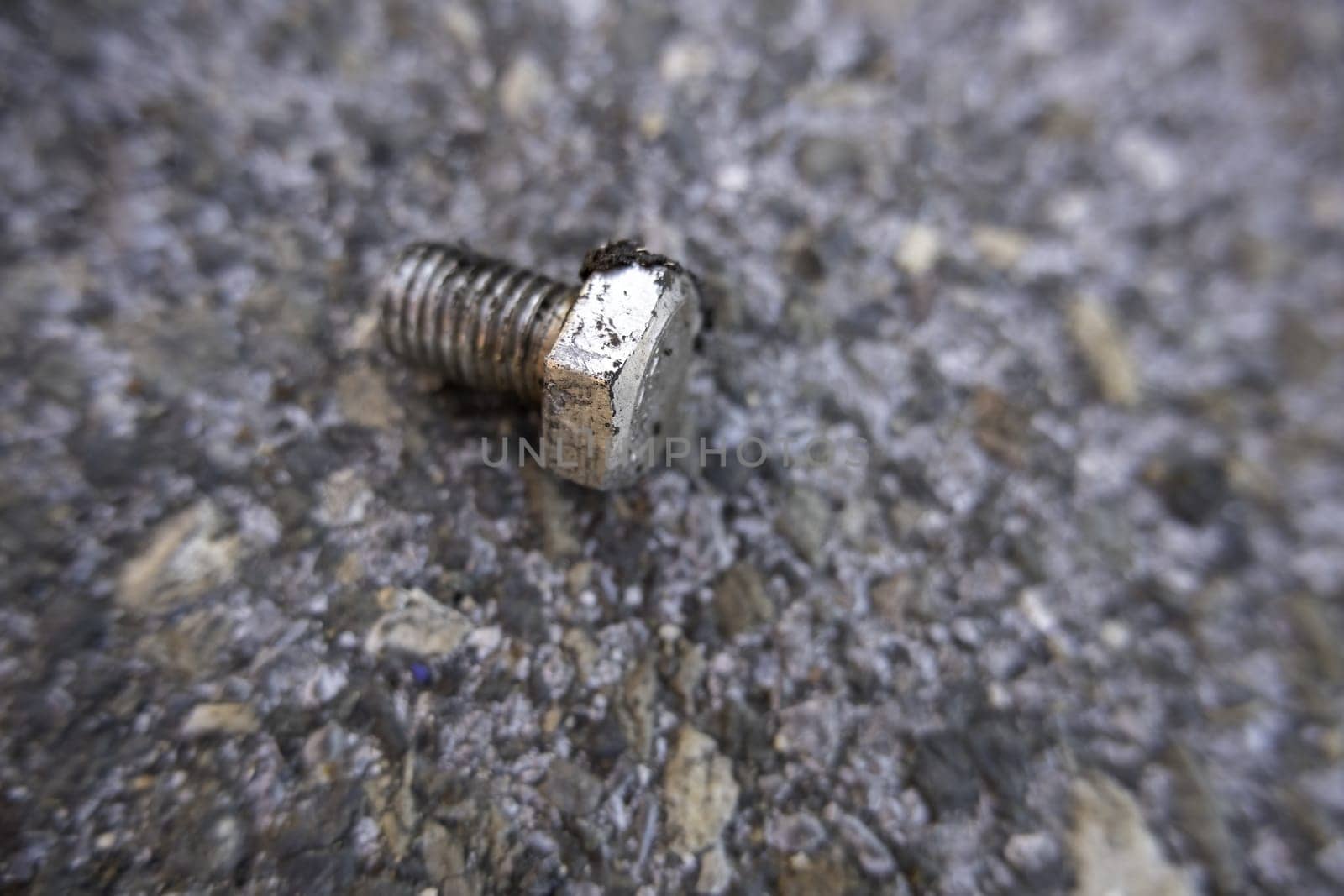 Detail of old broken and rusty industrial nut