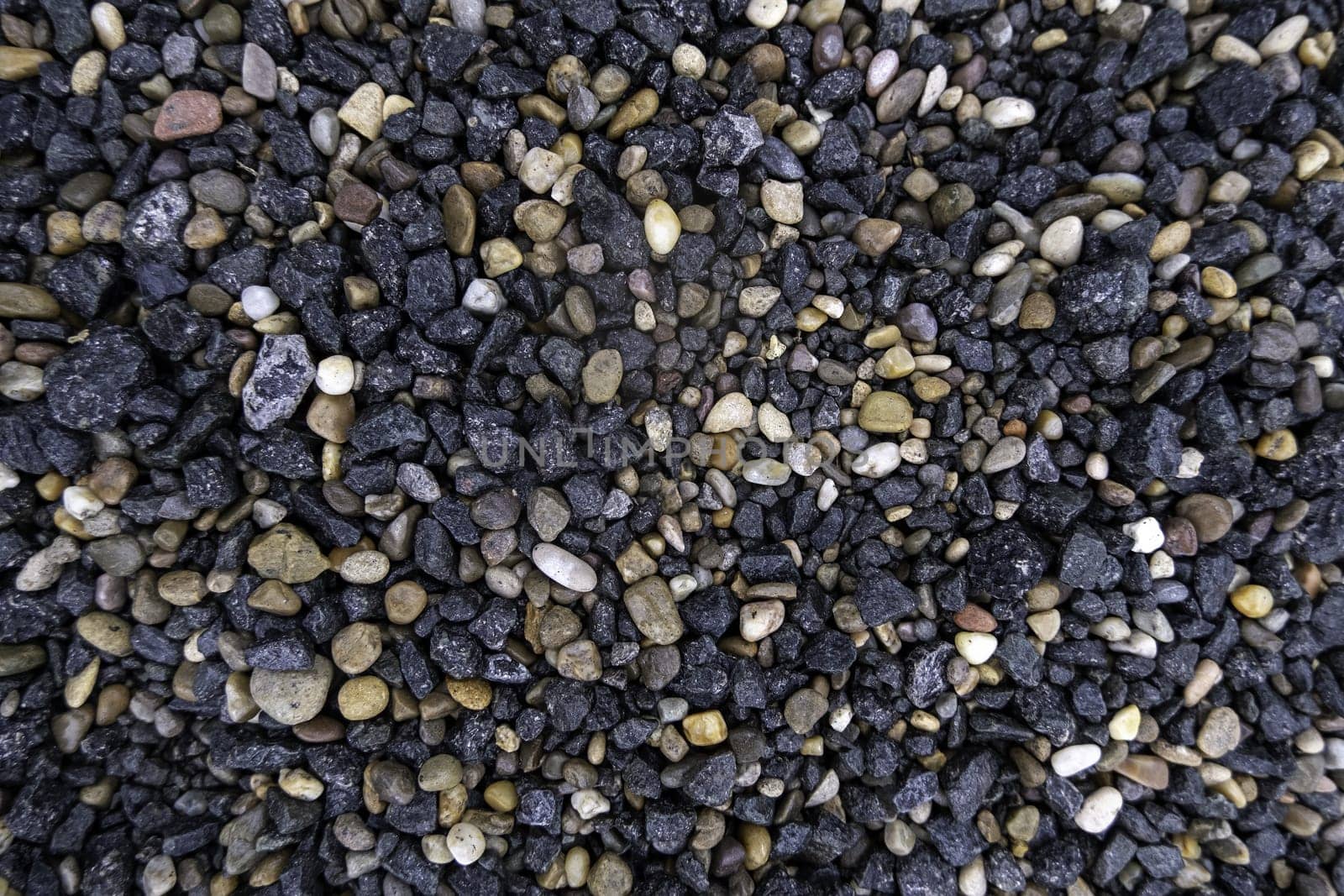 Detail of wet boulders on a cold rainy day