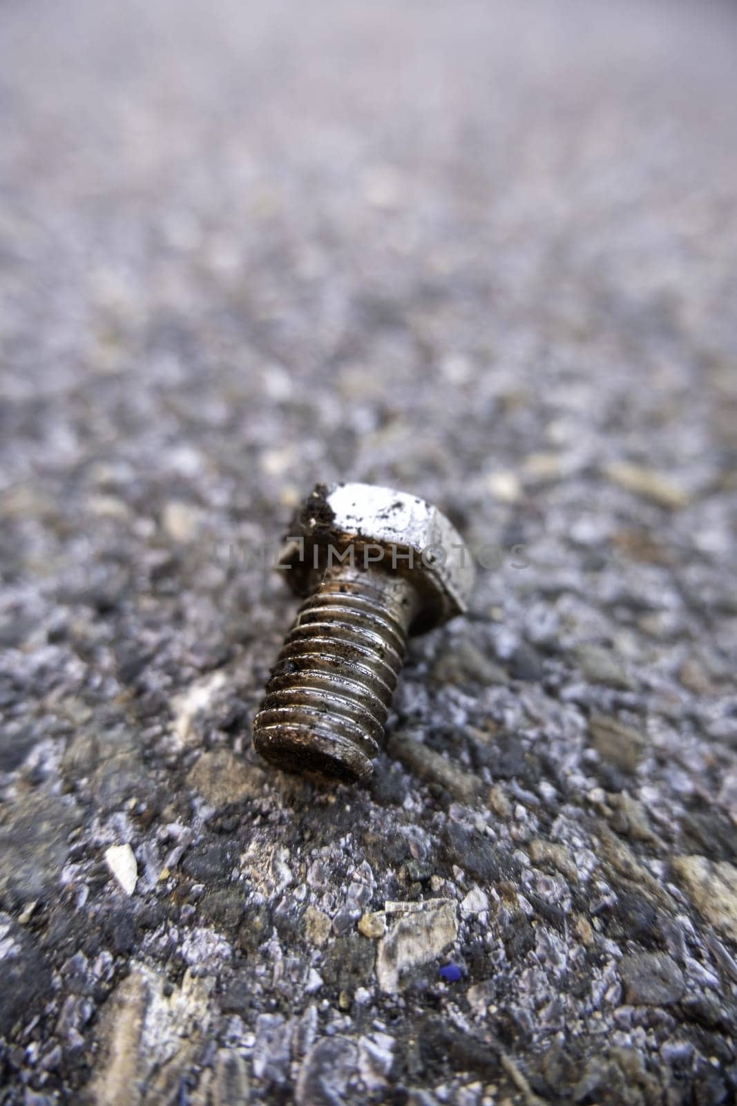 Detail of old broken and rusty industrial nut