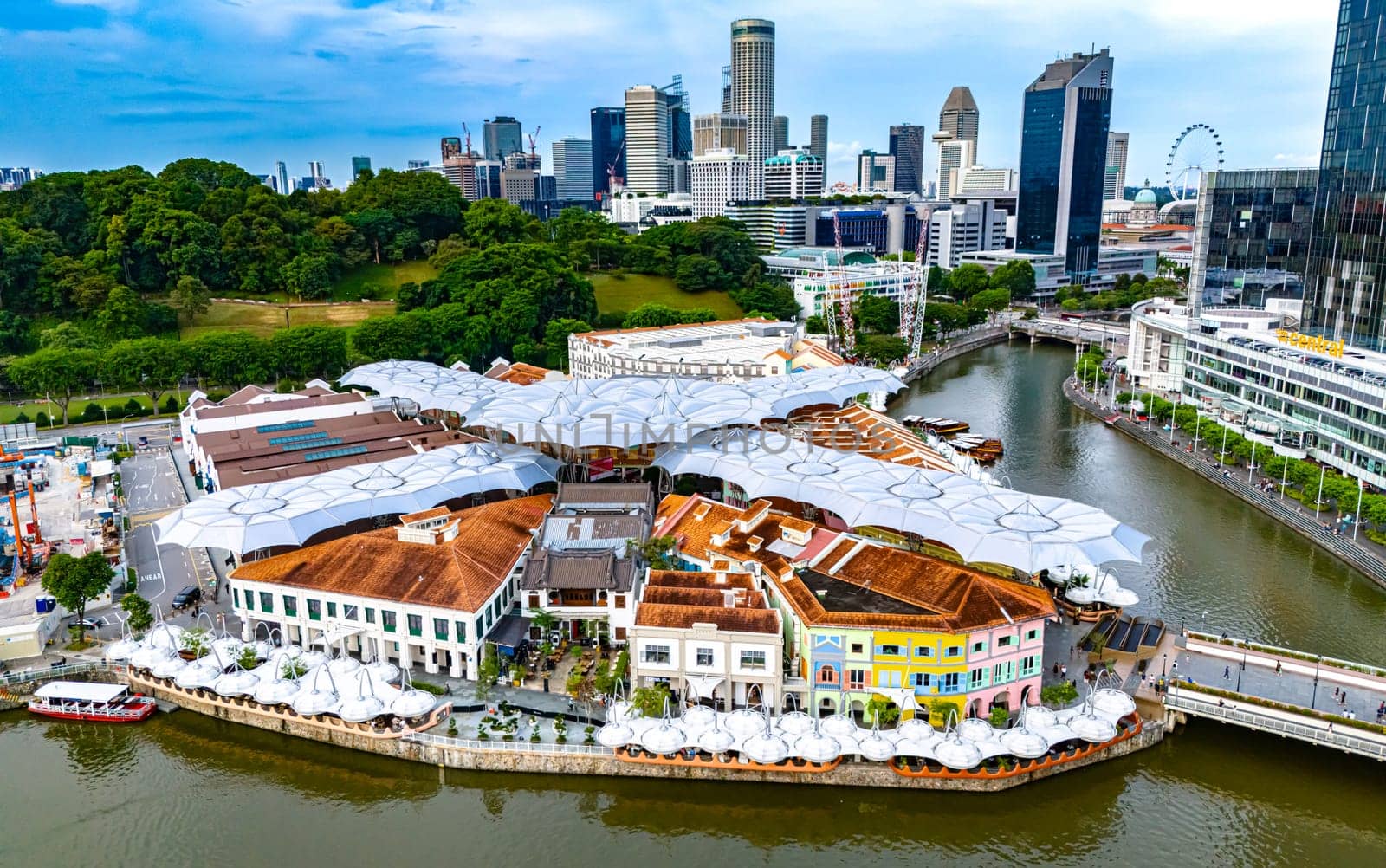 SINGAPORE - MAY 12, 2024: Clarke Quay after sunset, popular nightlife district of Singapore
