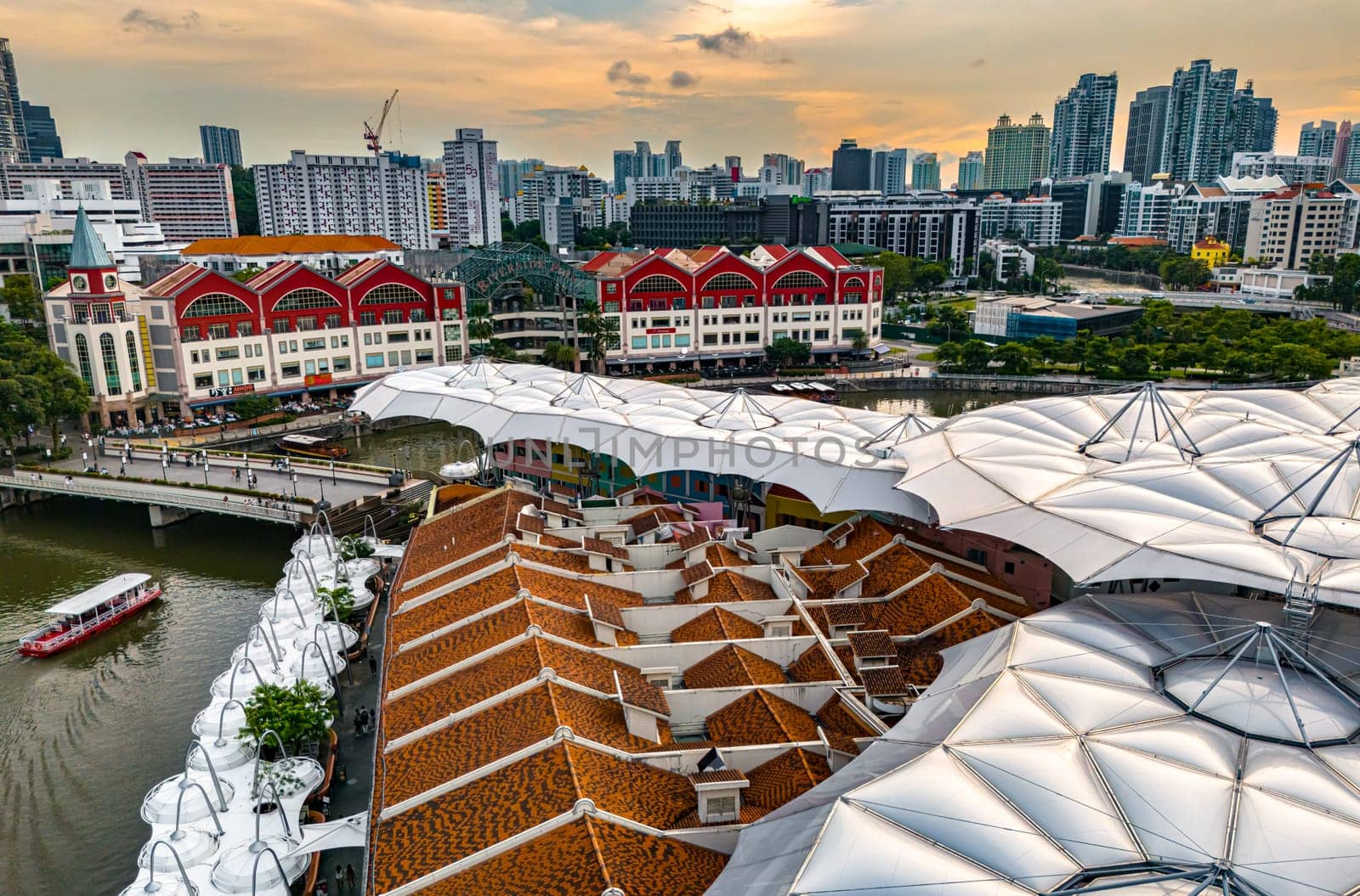 SINGAPORE - MAY 12, 2024: Clarke Quay after sunset, popular nightlife district of Singapore