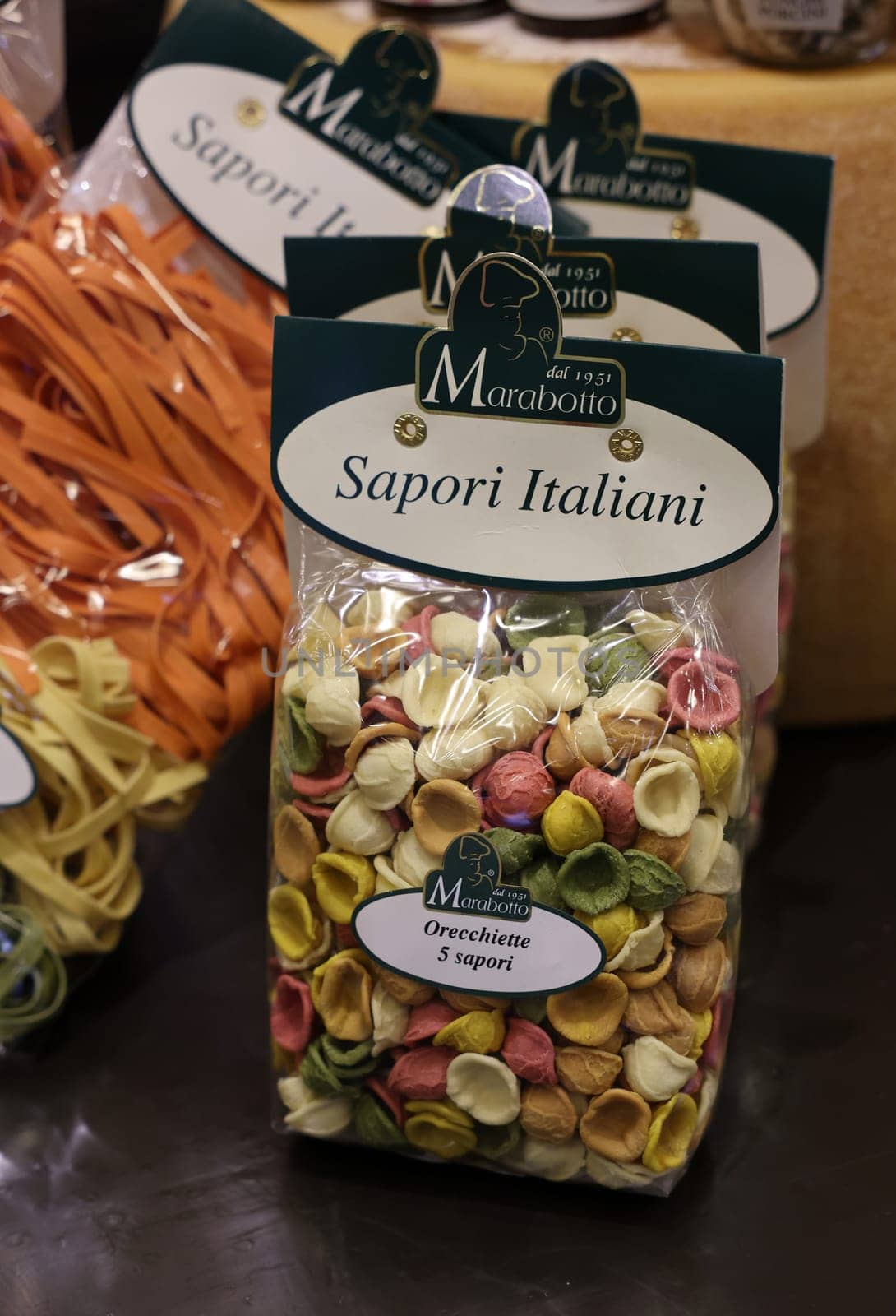 Cracow, Poland - November 3, 2021: Variety of types, shapes and colors of Italian pasta at Enoexpo and Gastrofood - Trade Fair for Food and Drinks for Catering