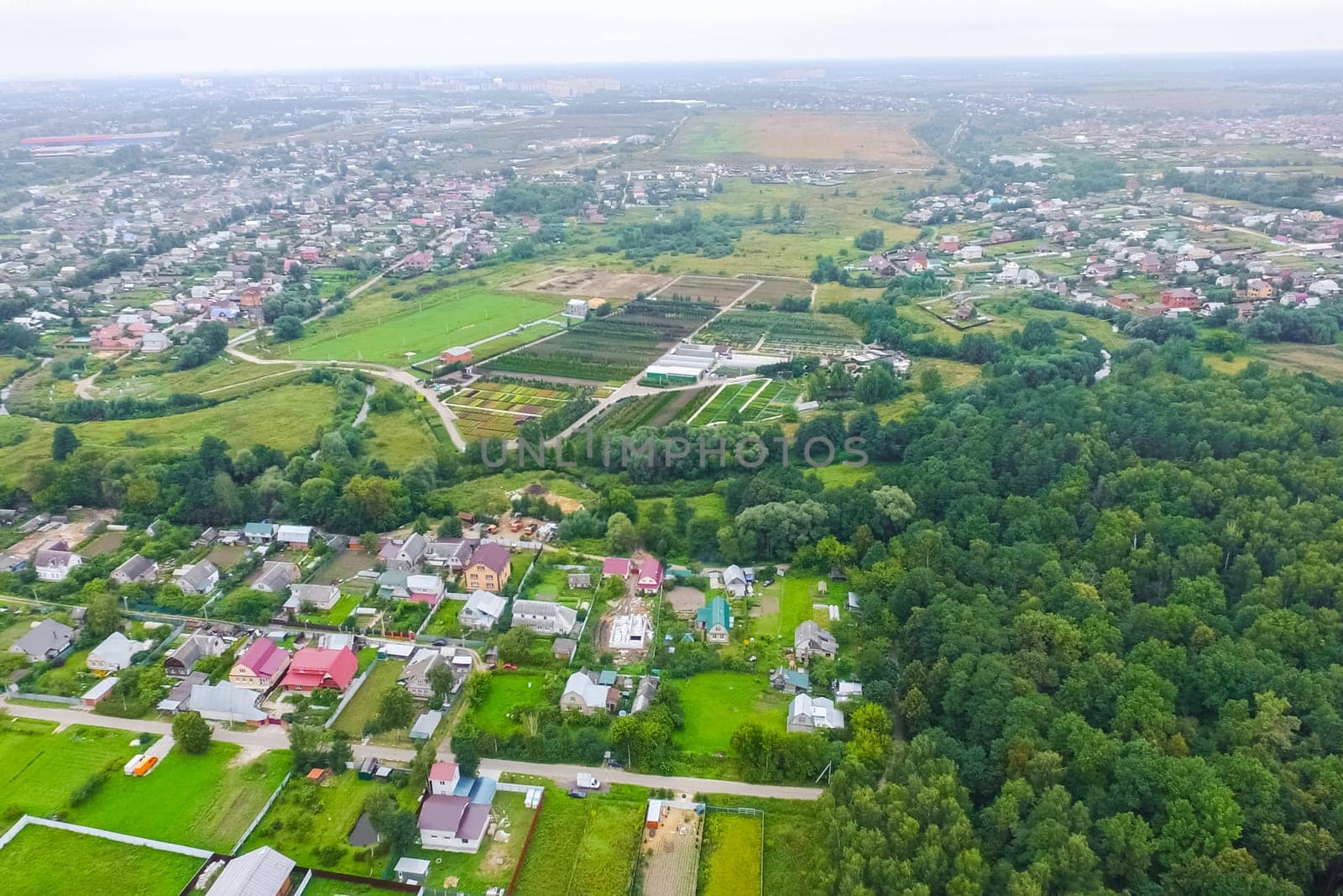 Top view of the village, fields and forests near the village