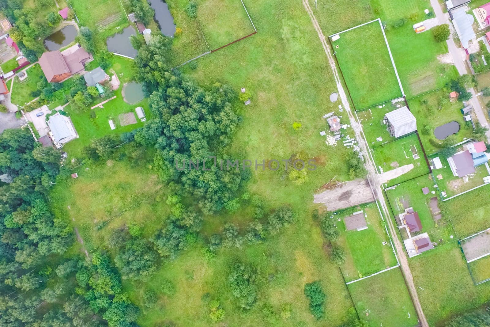 Top view of the village, fields and forests near the village