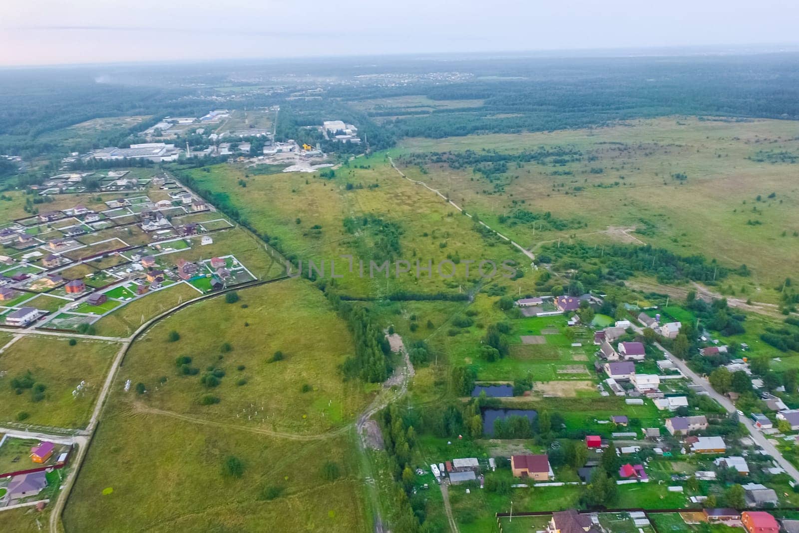 Top view of the village, fields and forests near the village