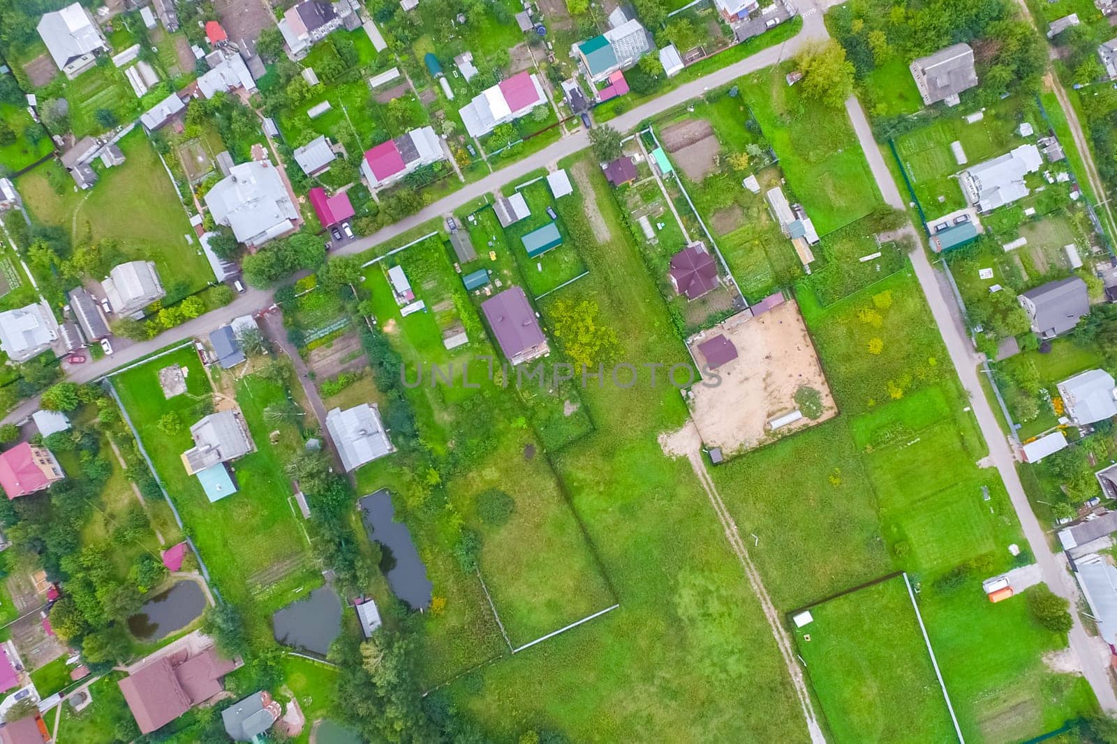 Top view of the village, fields and forests near the village