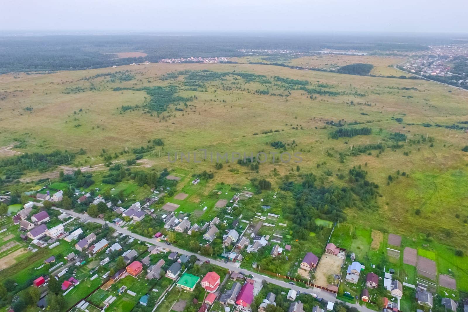 Top view of the village, fields and forests near the village
