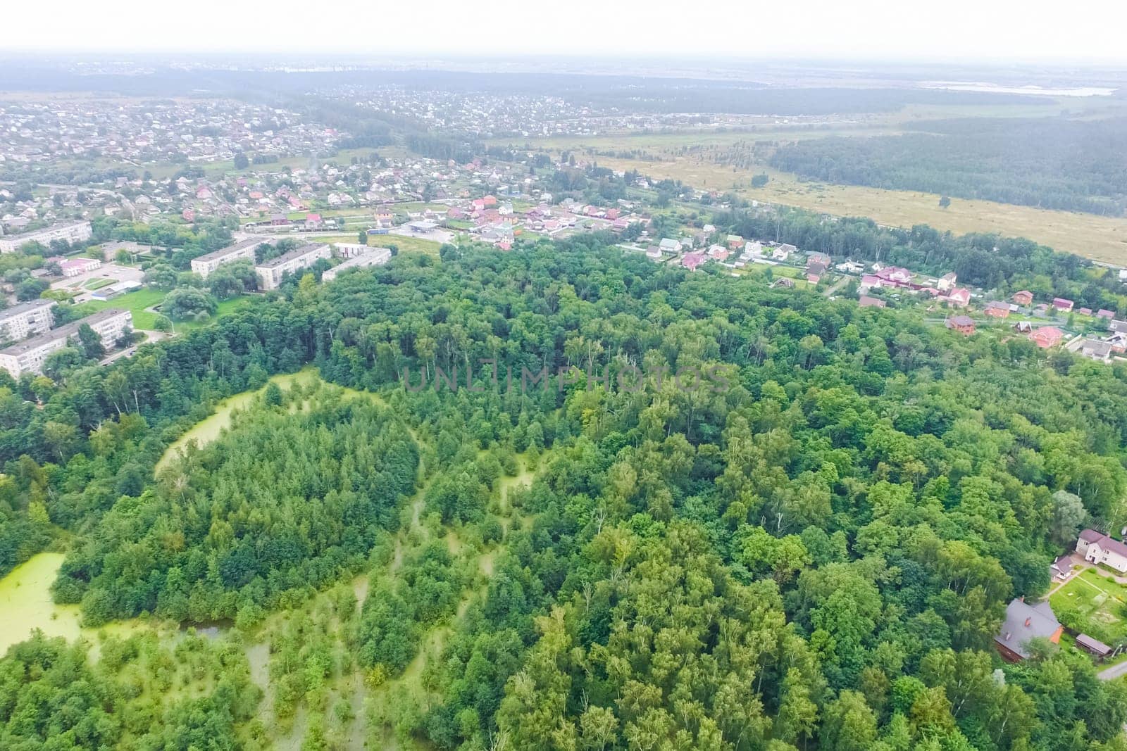Top view of the village, fields and forests near the village
