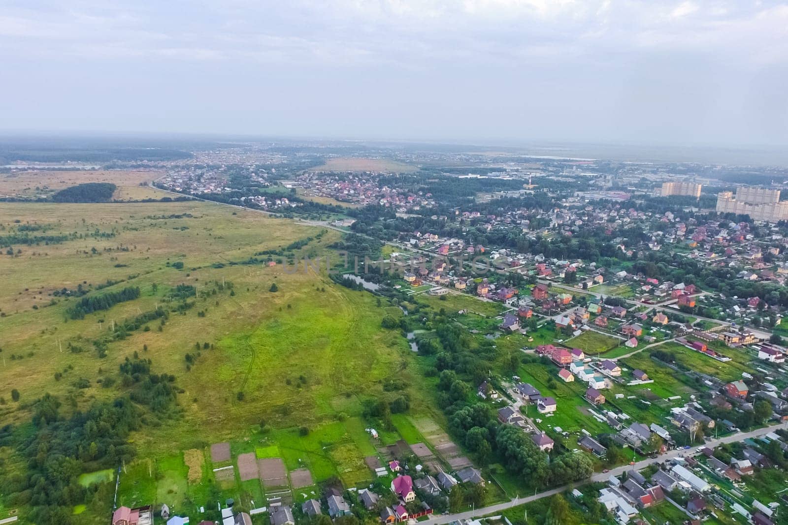 Top view of the village, fields and forests near the village