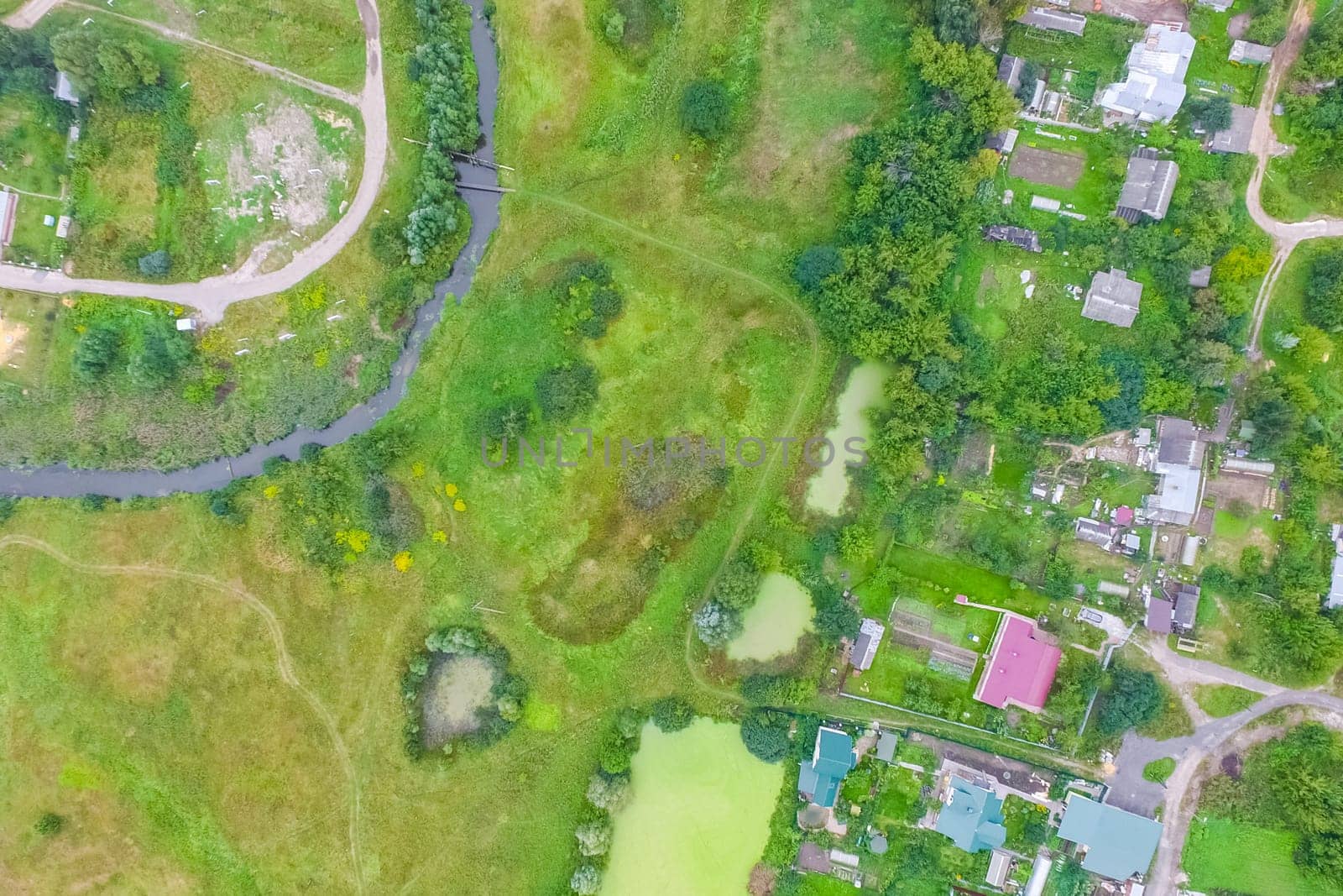 Top view of the village, fields and forests near the village