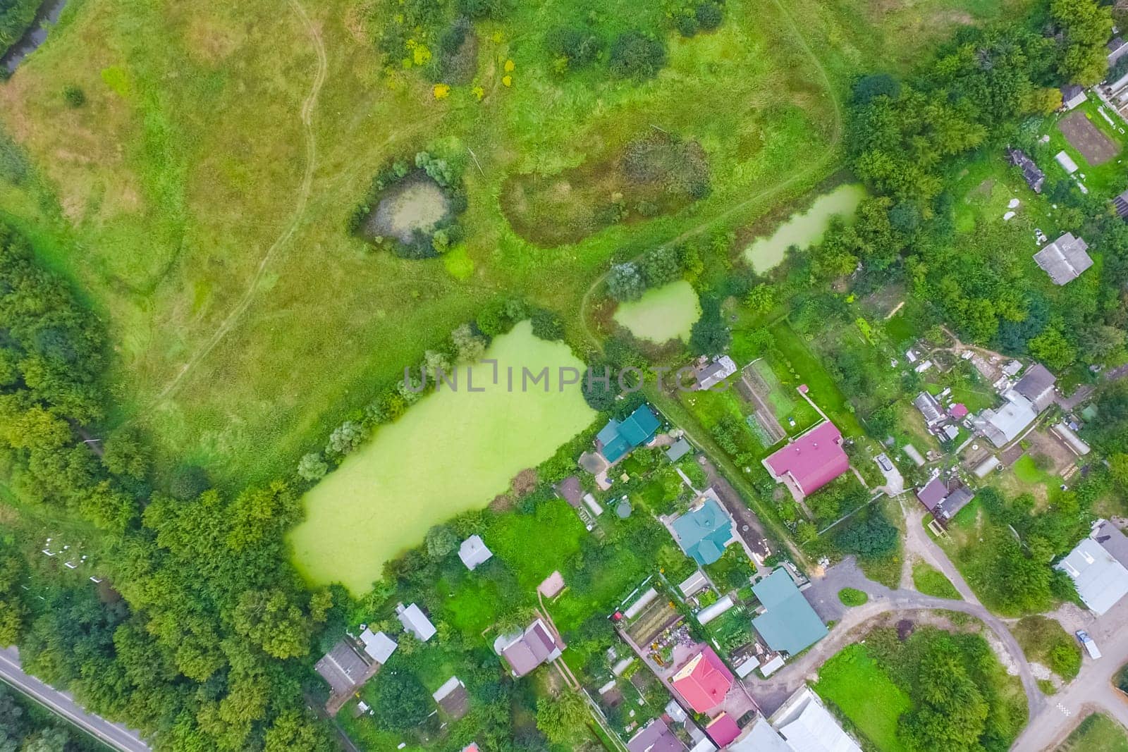 Top view of the village, fields and forests near the village