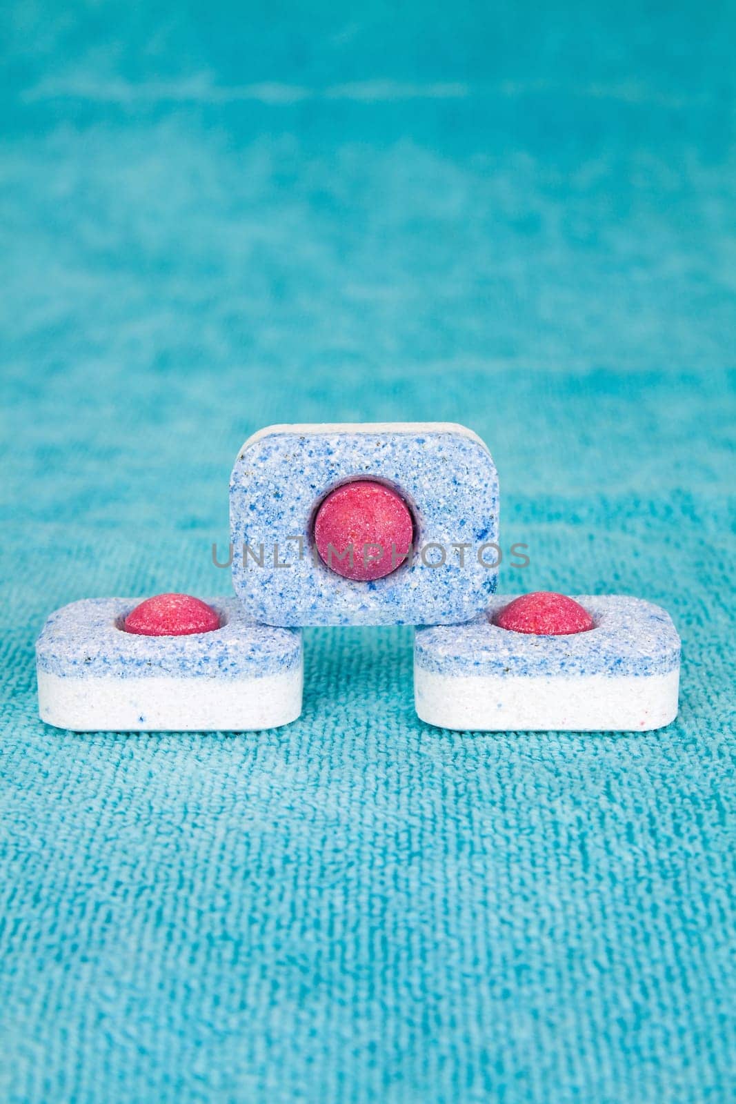 Group of three modern chemical tablets for dishwasher