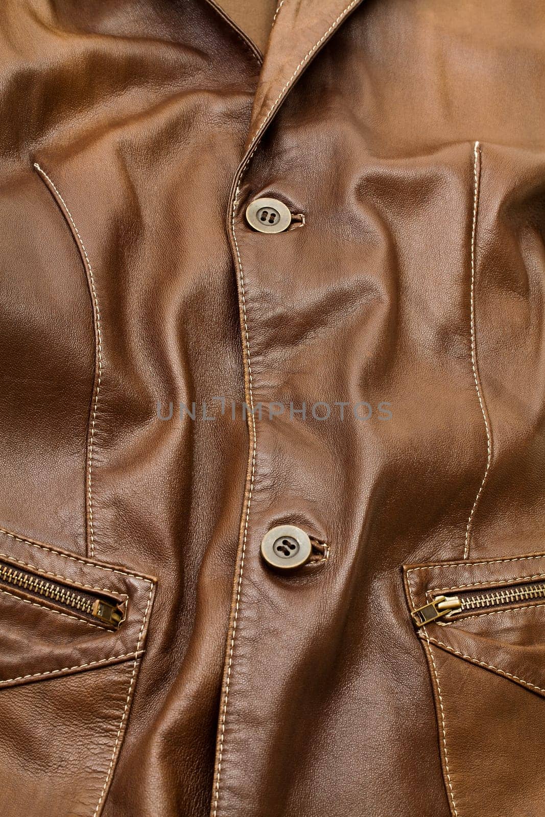 Detail of light brown leather clothing with a distinctive color and texture